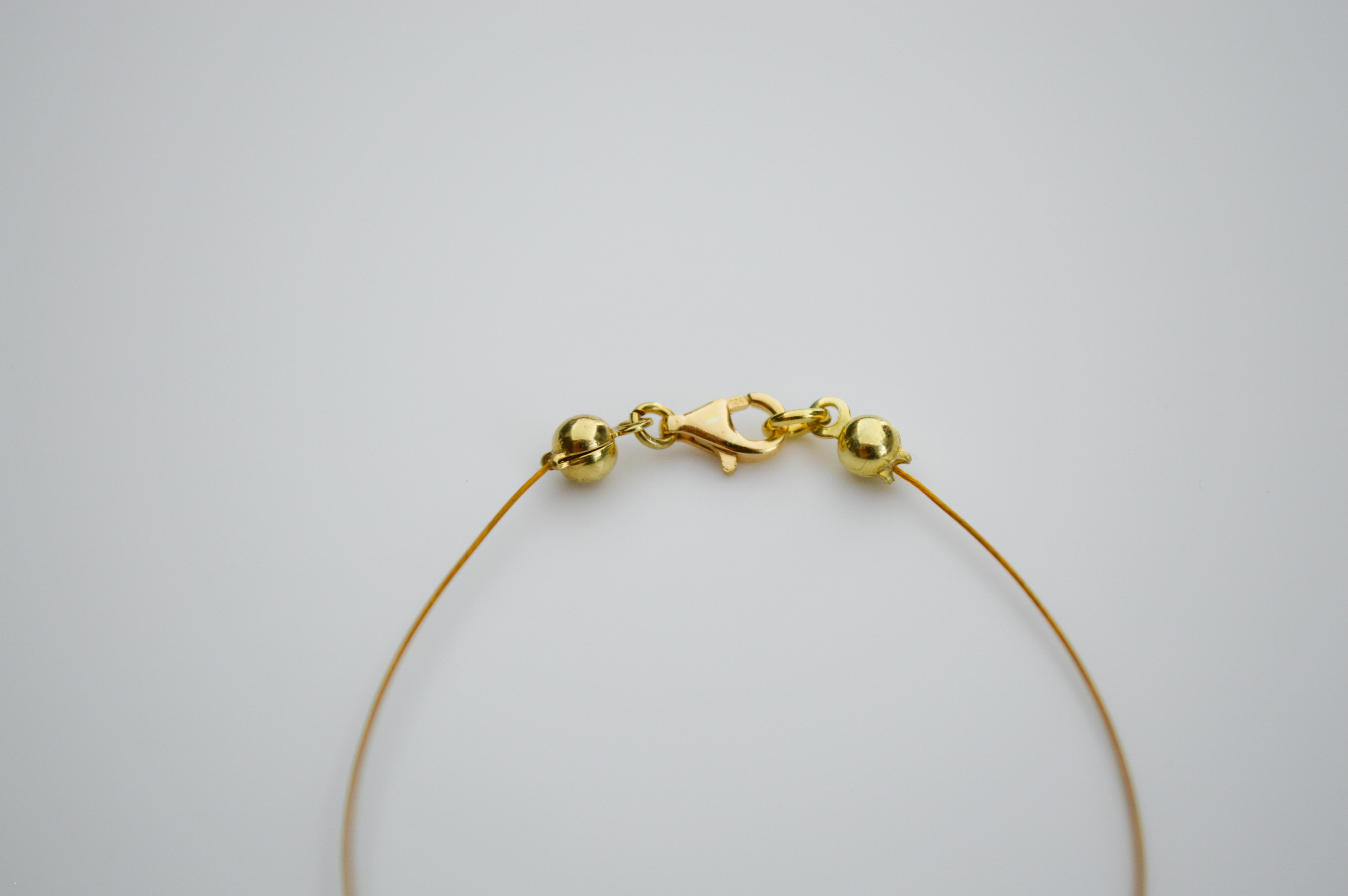 Apyrankė "Gausa" ausko spalva