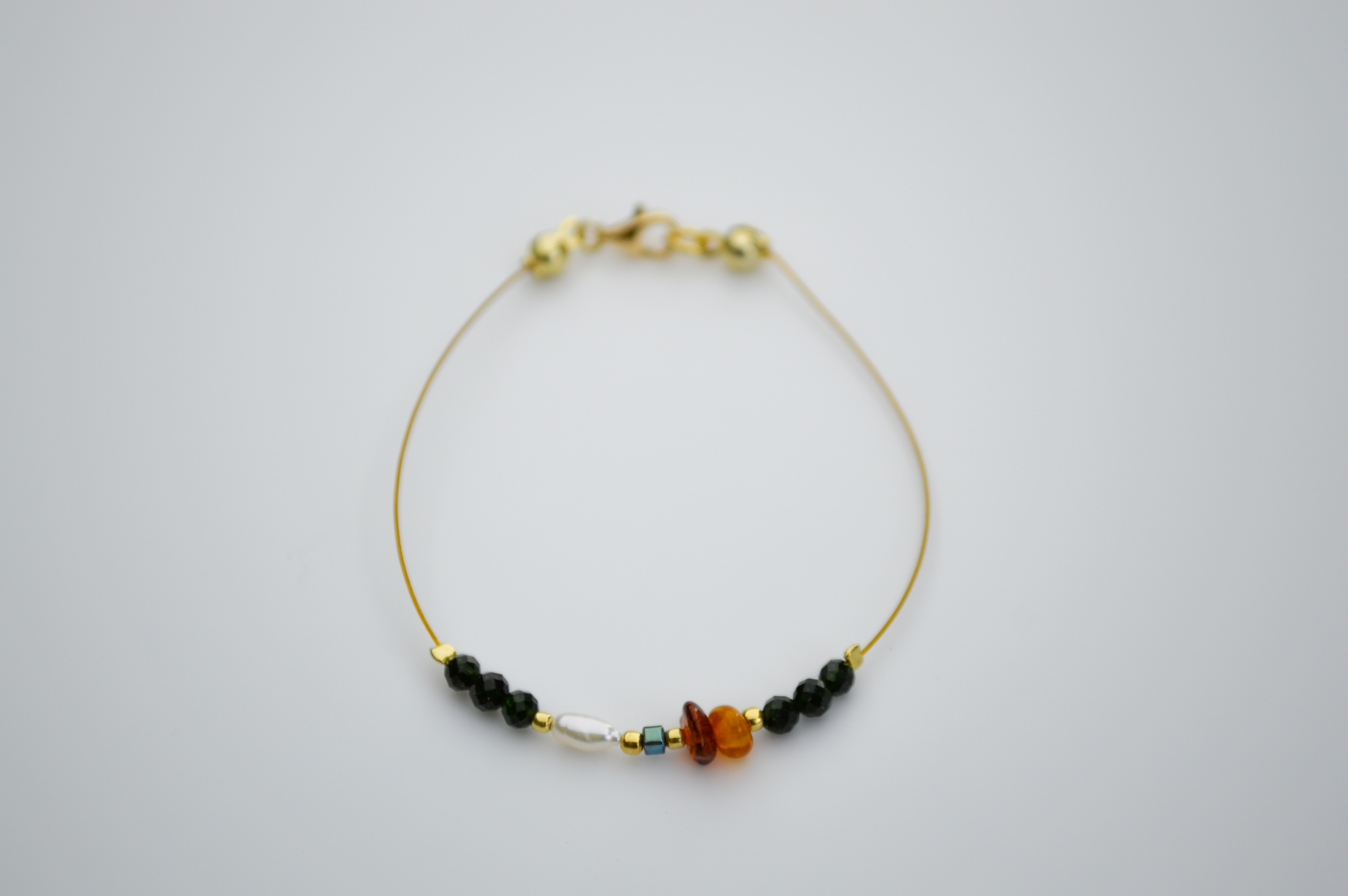 Apyrankė "Harmonija" ausko spalva 