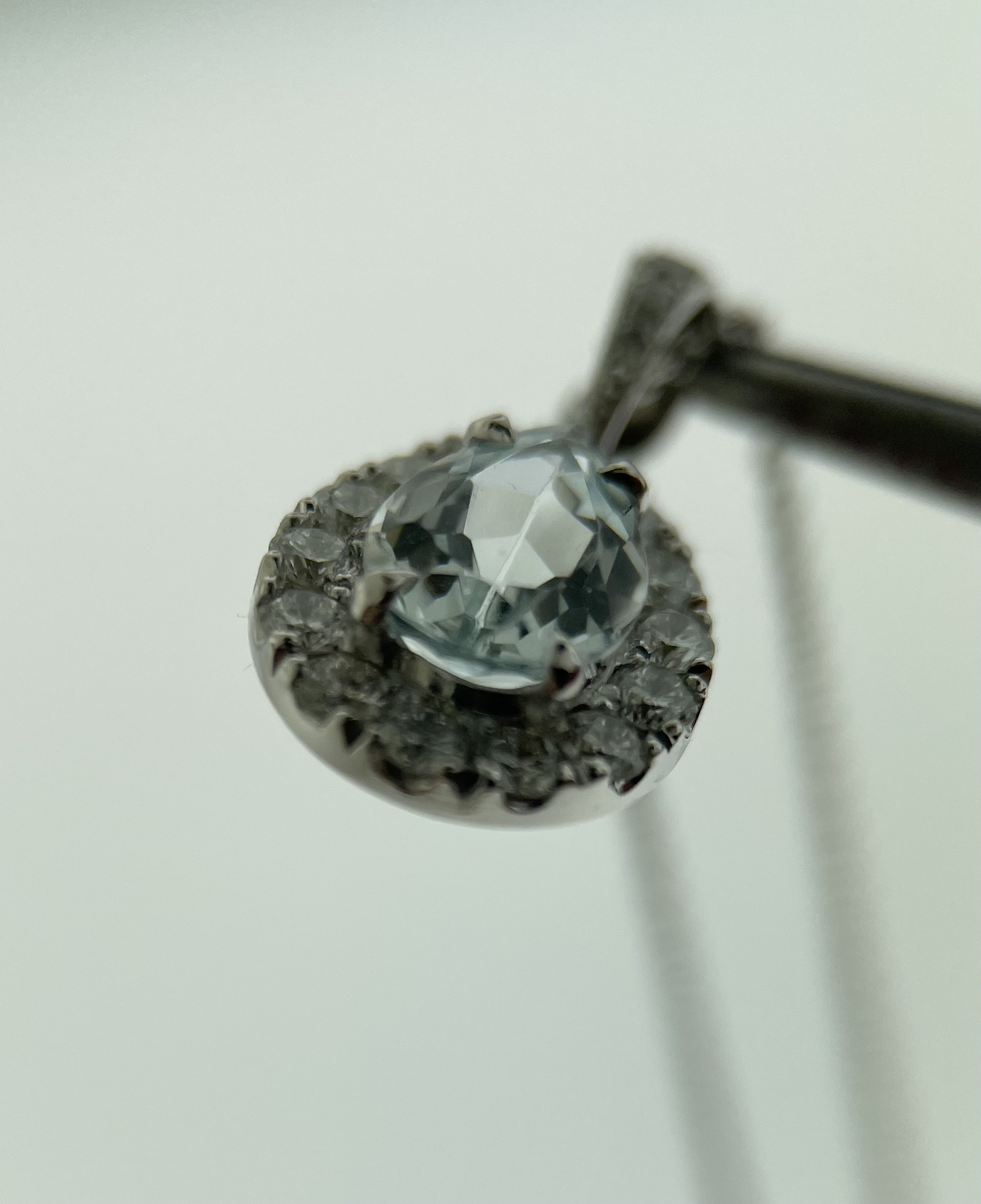 18k white pear halo aquamarine and diamond pendant