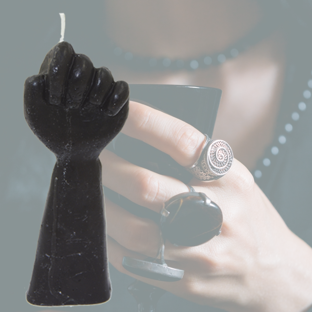 Vela Puño Negro