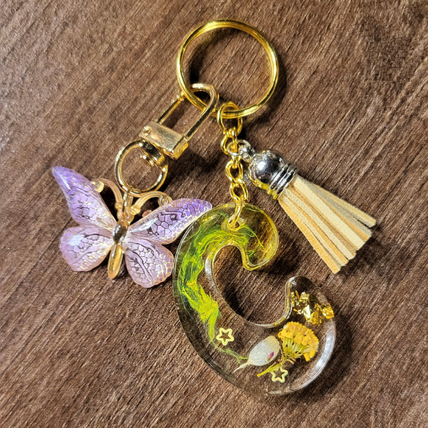 Llavero Flores Silvestres, con acesorio y bolsita regalo. 