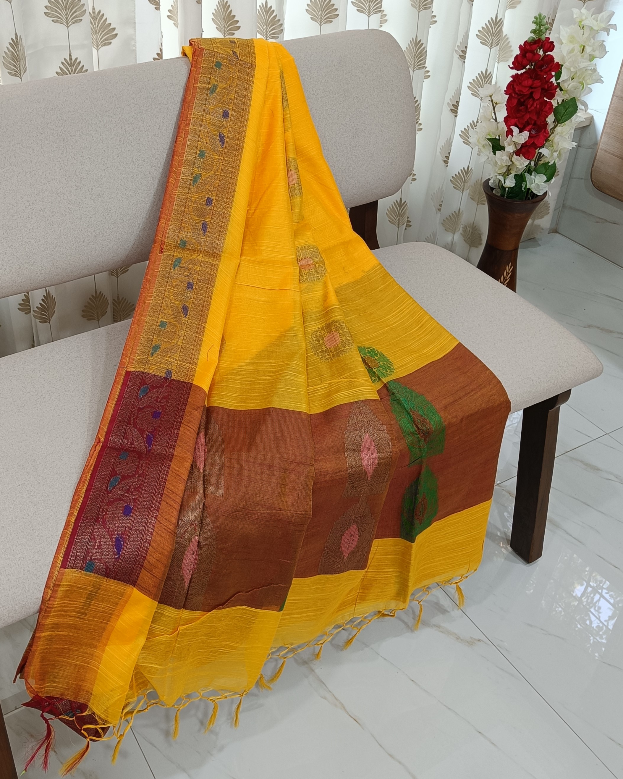 Bright Turmeric Yellow Muga Silk Saree With Contrasting Brown Pallu