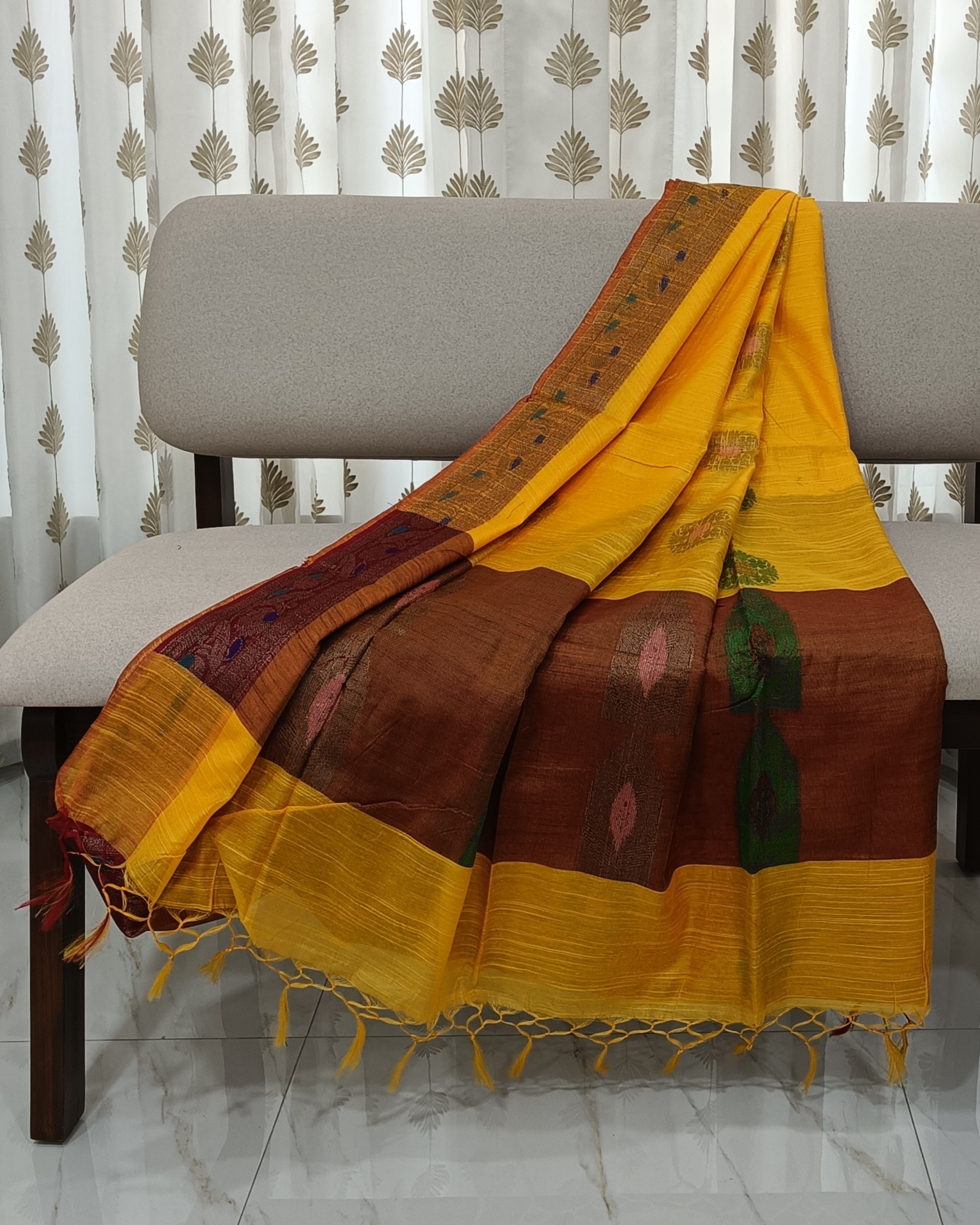 Bright Turmeric Yellow Muga Silk Saree With Contrasting Brown Pallu
