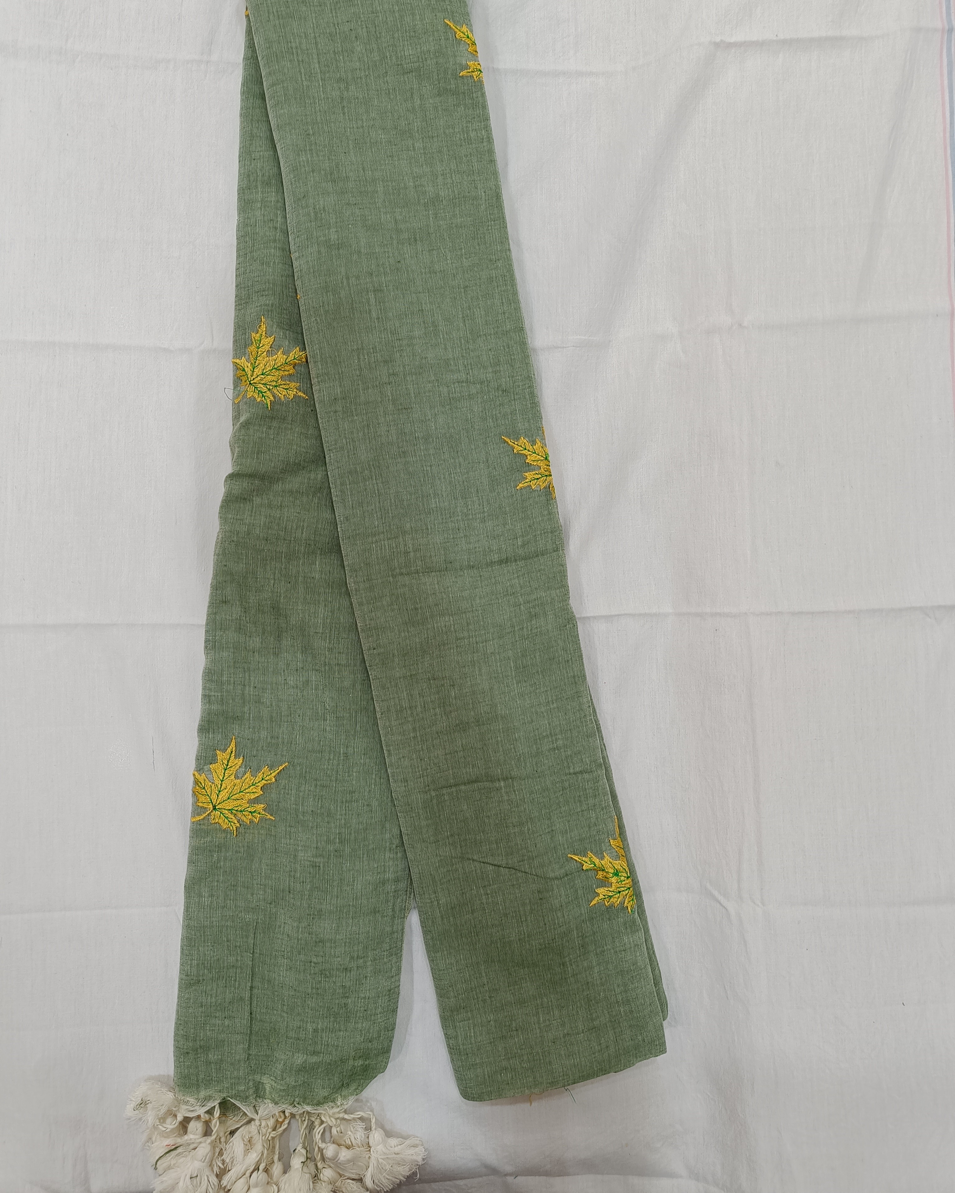 Pastel Green Saree With Yellow Maple Flowers Embroidered on Mulmul