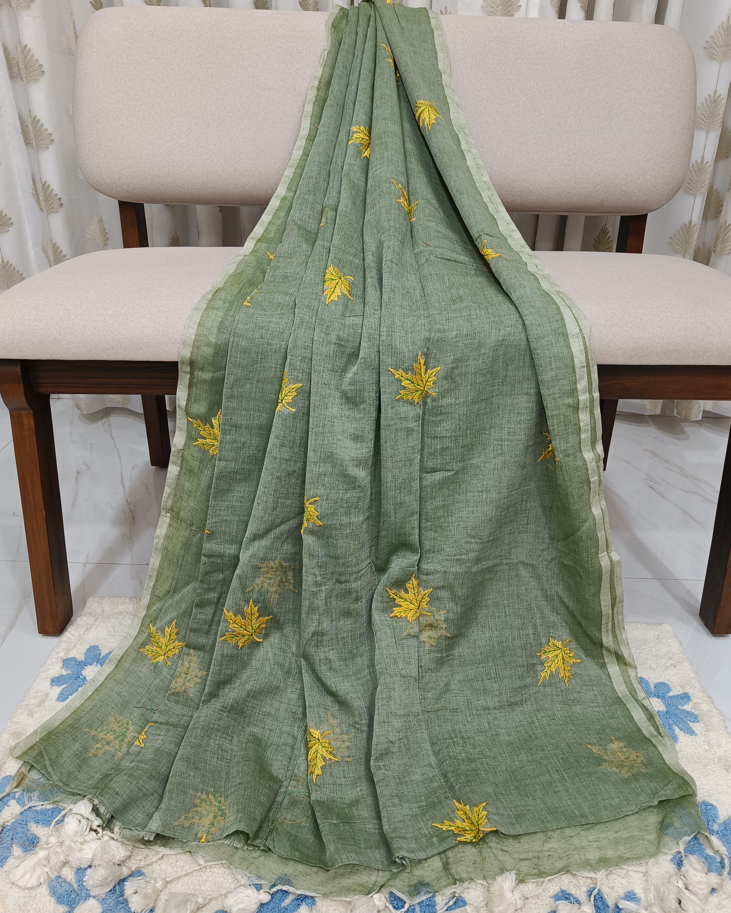 Pastel Green Saree With Yellow Maple Flowers Embroidered on Mulmul