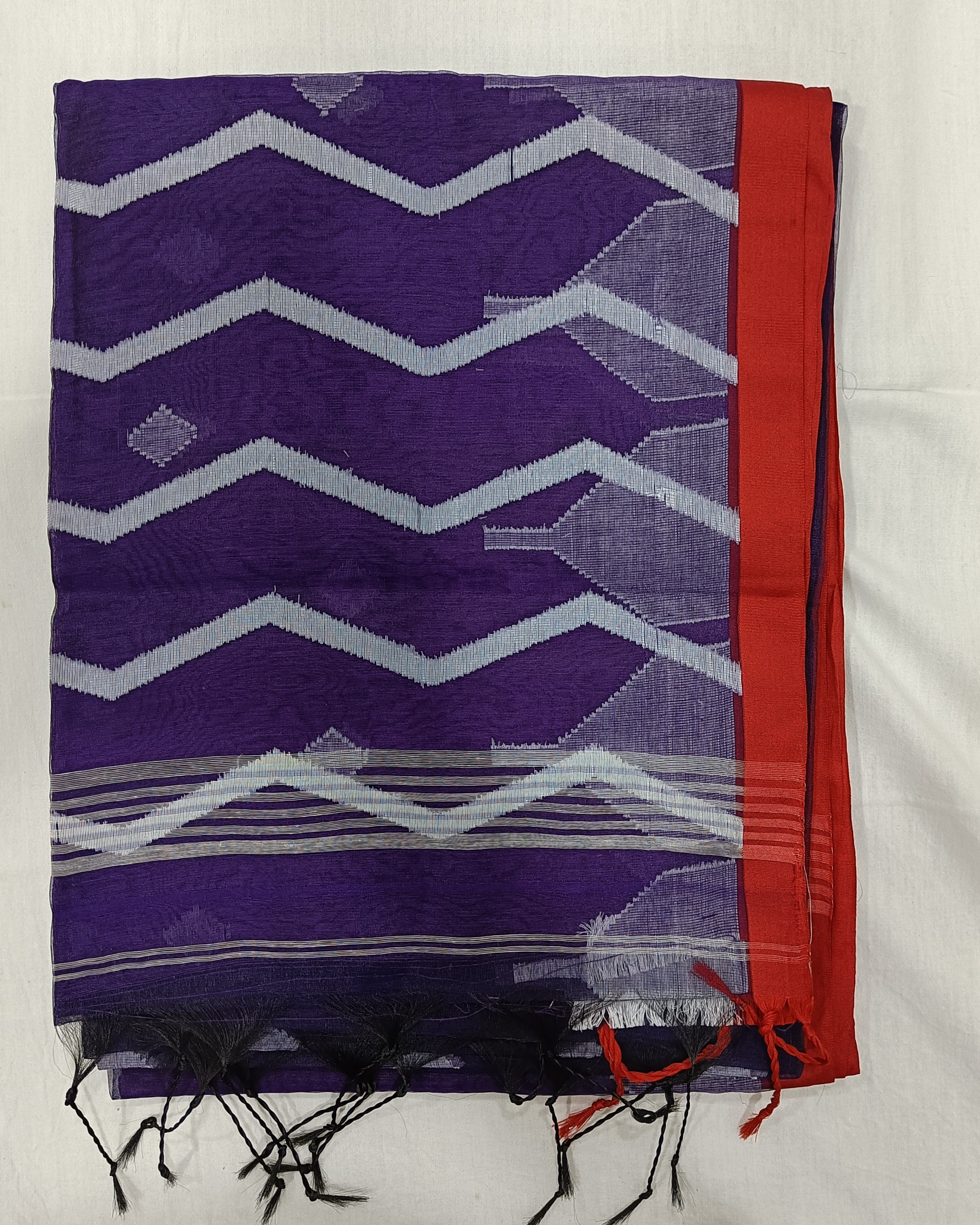 Royal Blue Transparent Muslin Saree with White Zig Zag Pattern on Pallu and Red Border