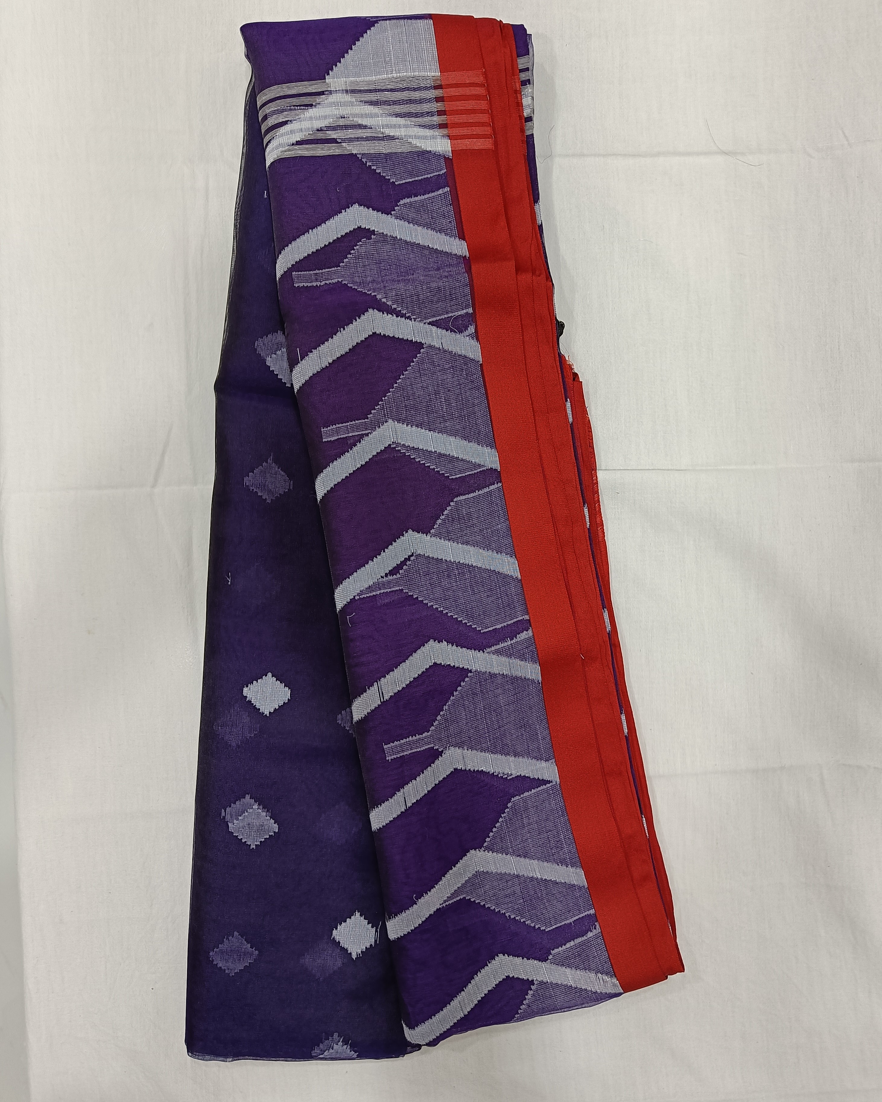 Royal Blue Transparent Muslin Saree with White Zig Zag Pattern on Pallu and Red Border