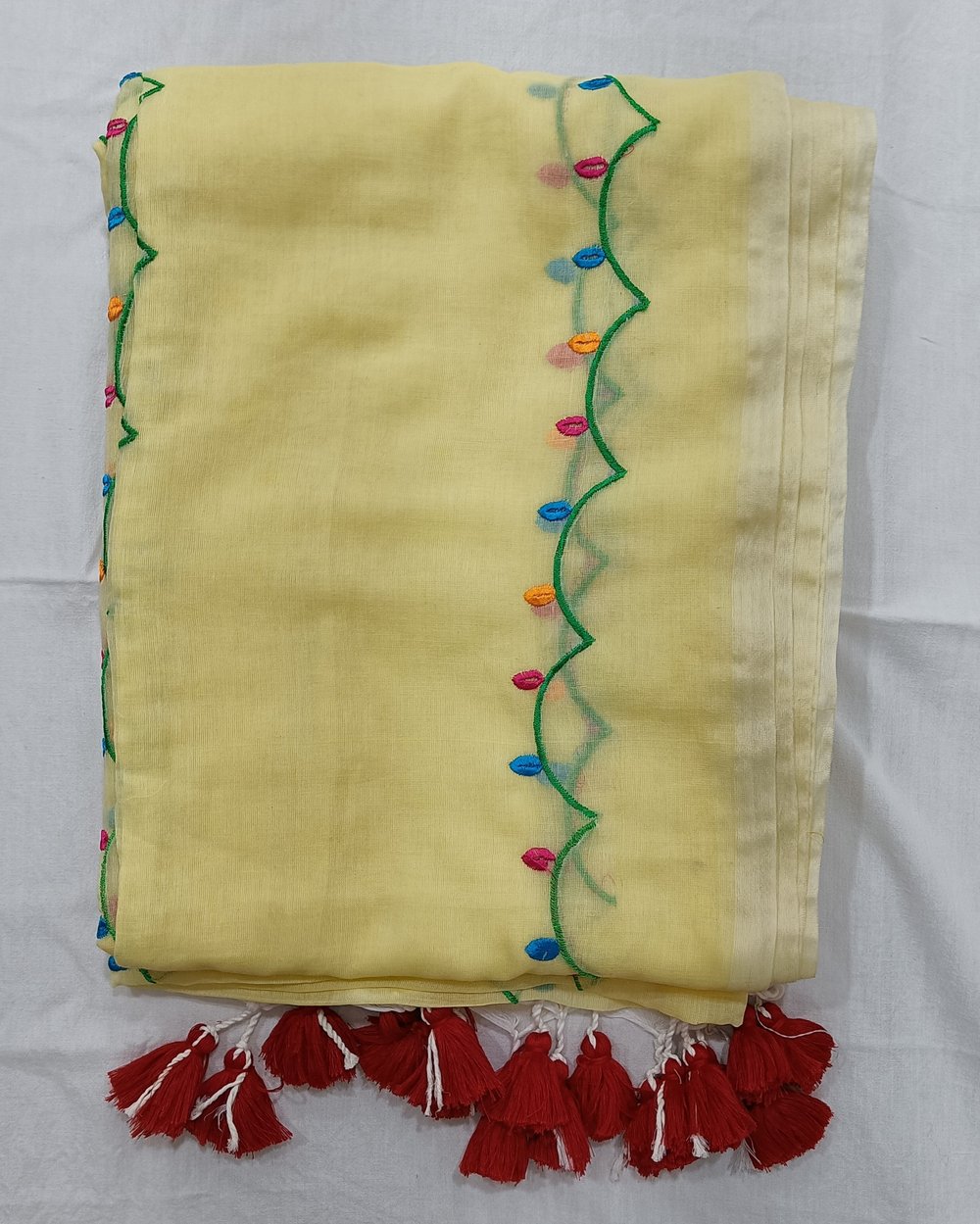 Yellow Mulmul Saree with Colorful Floral Embroidery