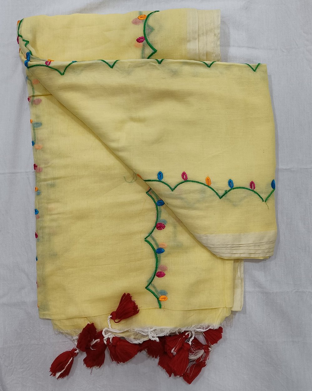Yellow Mulmul Saree with Colorful Floral Embroidery