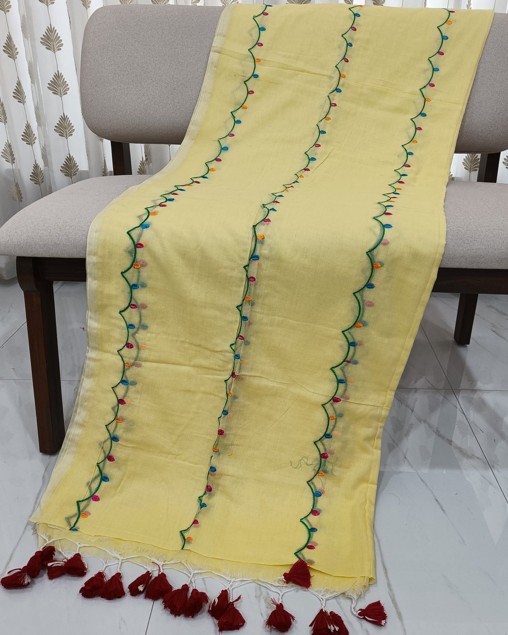Yellow Mulmul Saree with Colorful Floral Embroidery