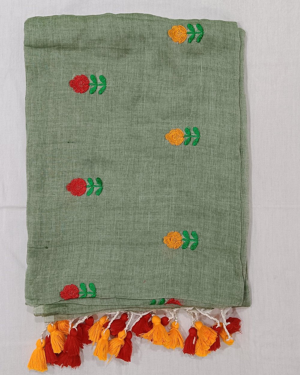 Pastel Green Mulmul Saree With Yellow And Red Flowers Embroidery