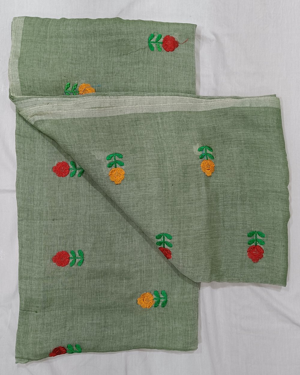 Pastel Green Mulmul Saree With Yellow And Red Flowers Embroidery