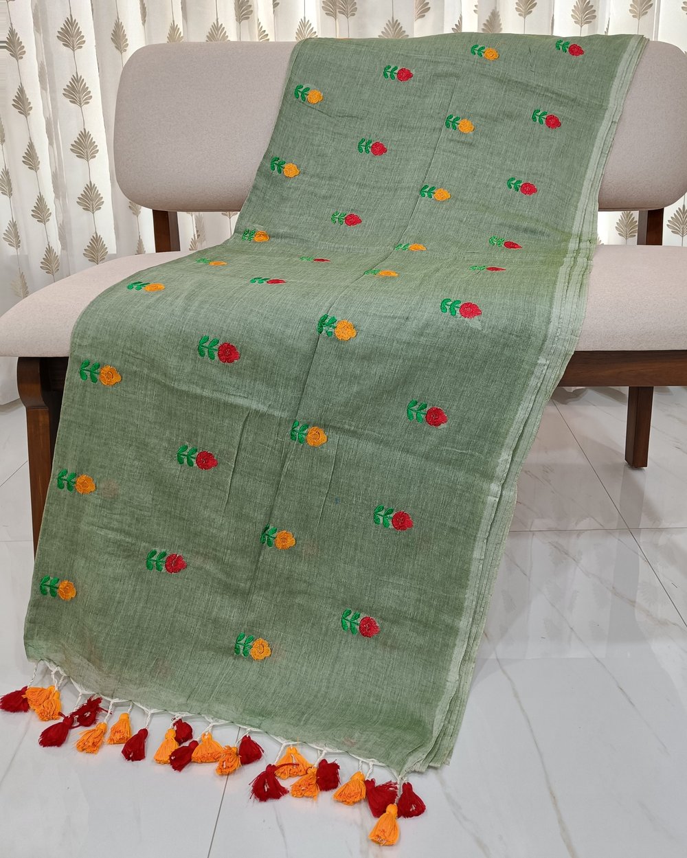 Pastel Green Mulmul Saree With Yellow And Red Flowers Embroidery