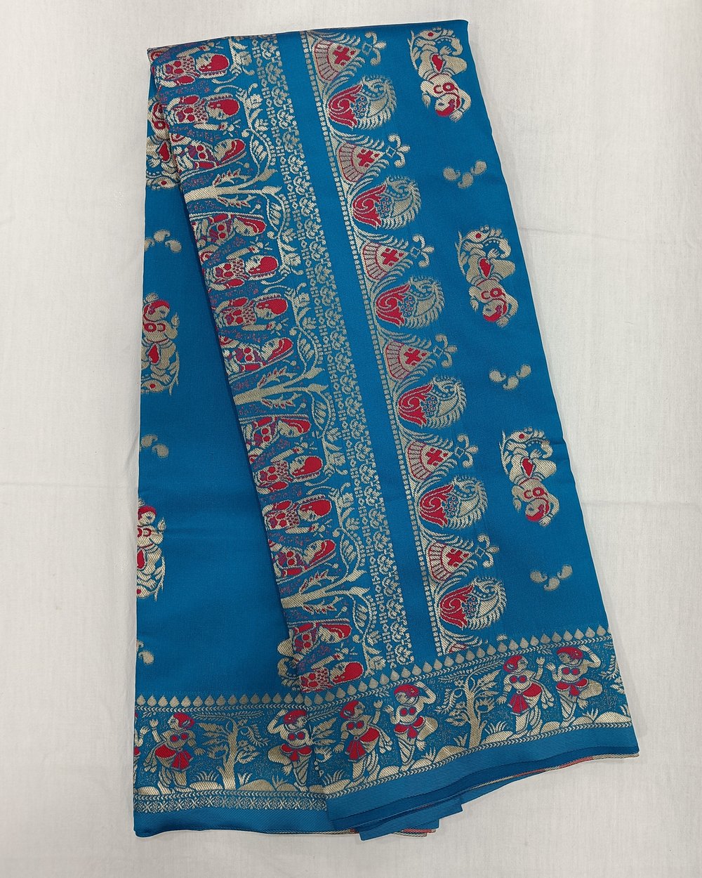 Blue Soft Silk Saree WIth Figure Motifs Weaved In Pink And Silver