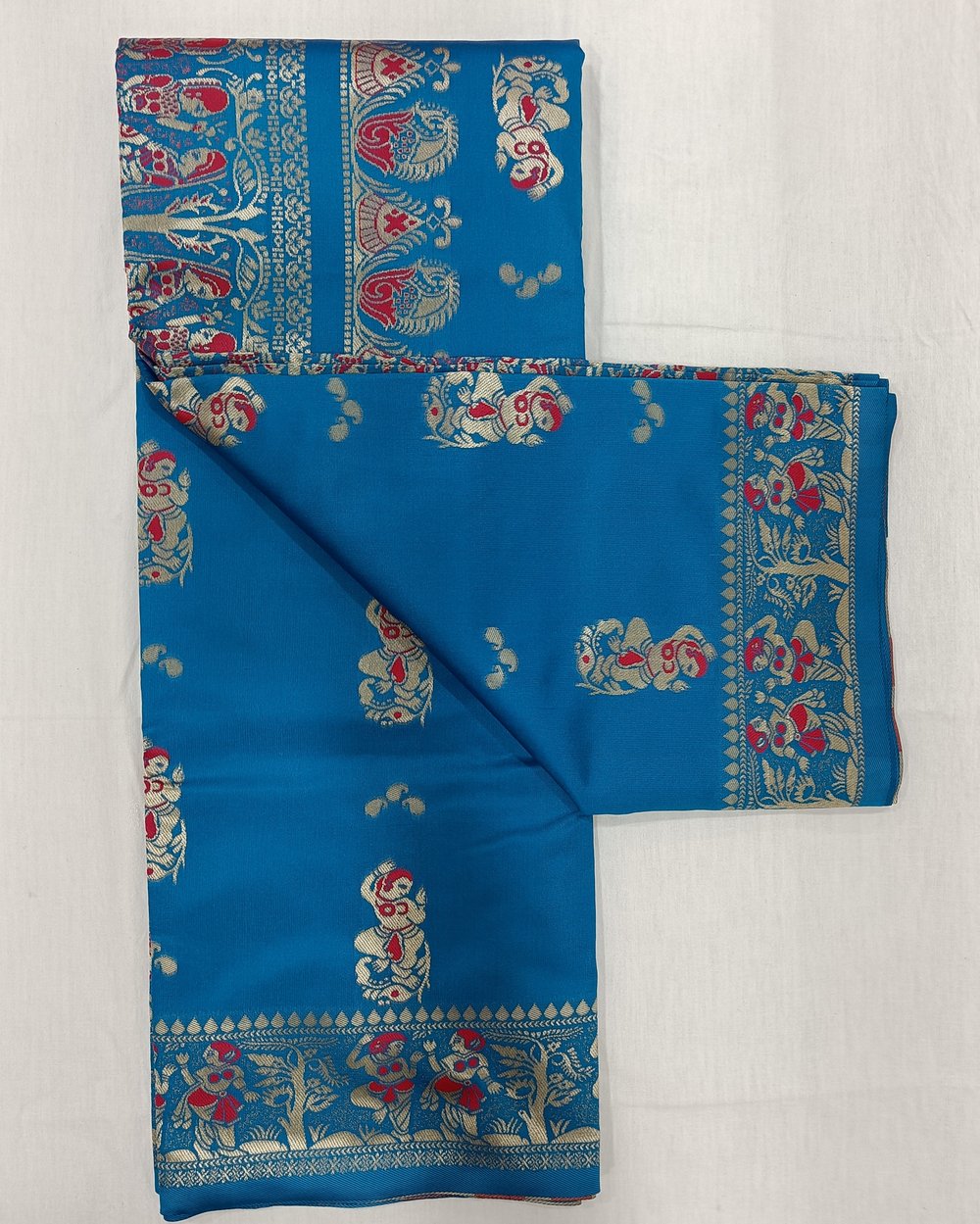 Blue Soft Silk Saree WIth Figure Motifs Weaved In Pink And Silver