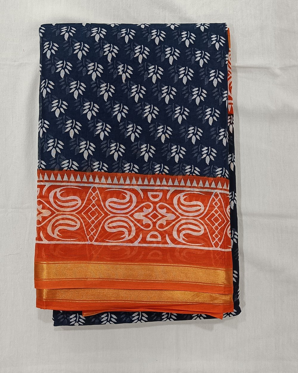 Blue Color Cotton Chanderi Saree With White Floral Design And Orange Pallu