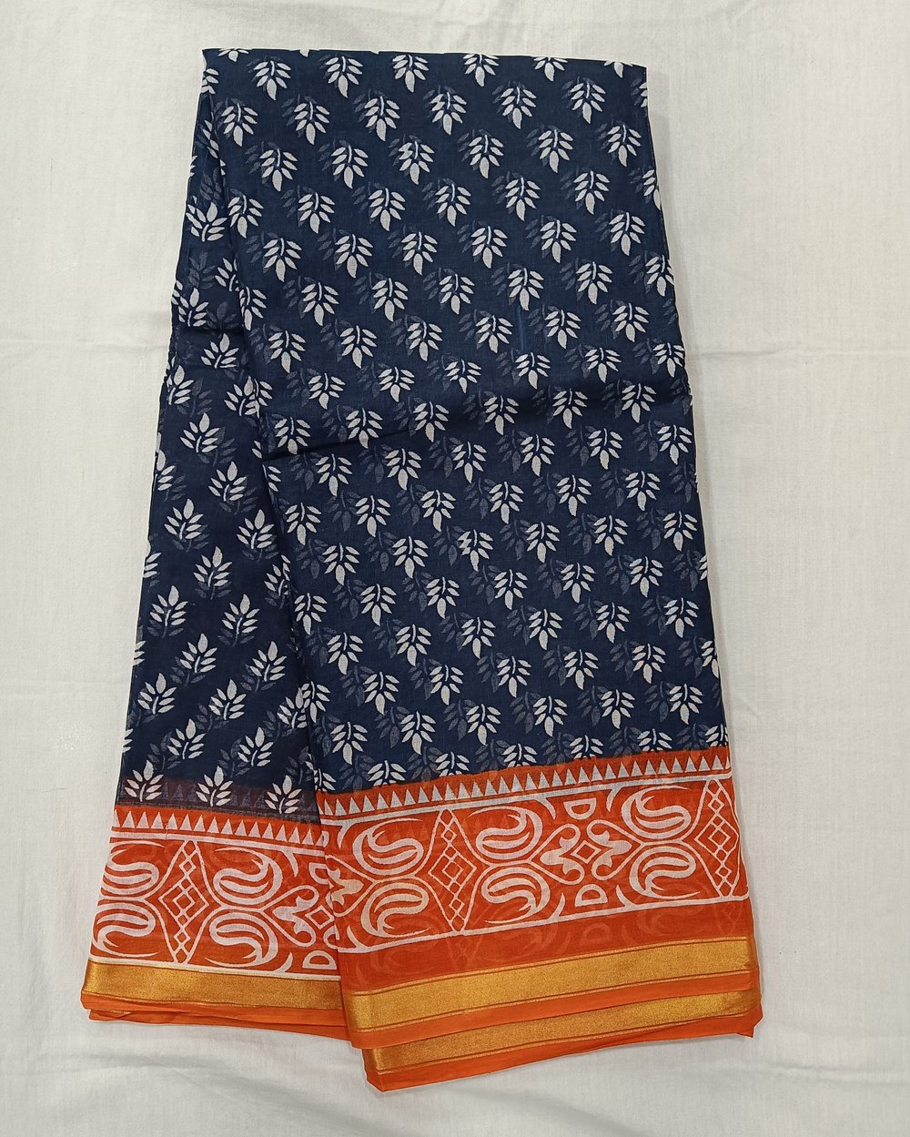 Blue Color Cotton Chanderi Saree With White Floral Design And Orange Pallu