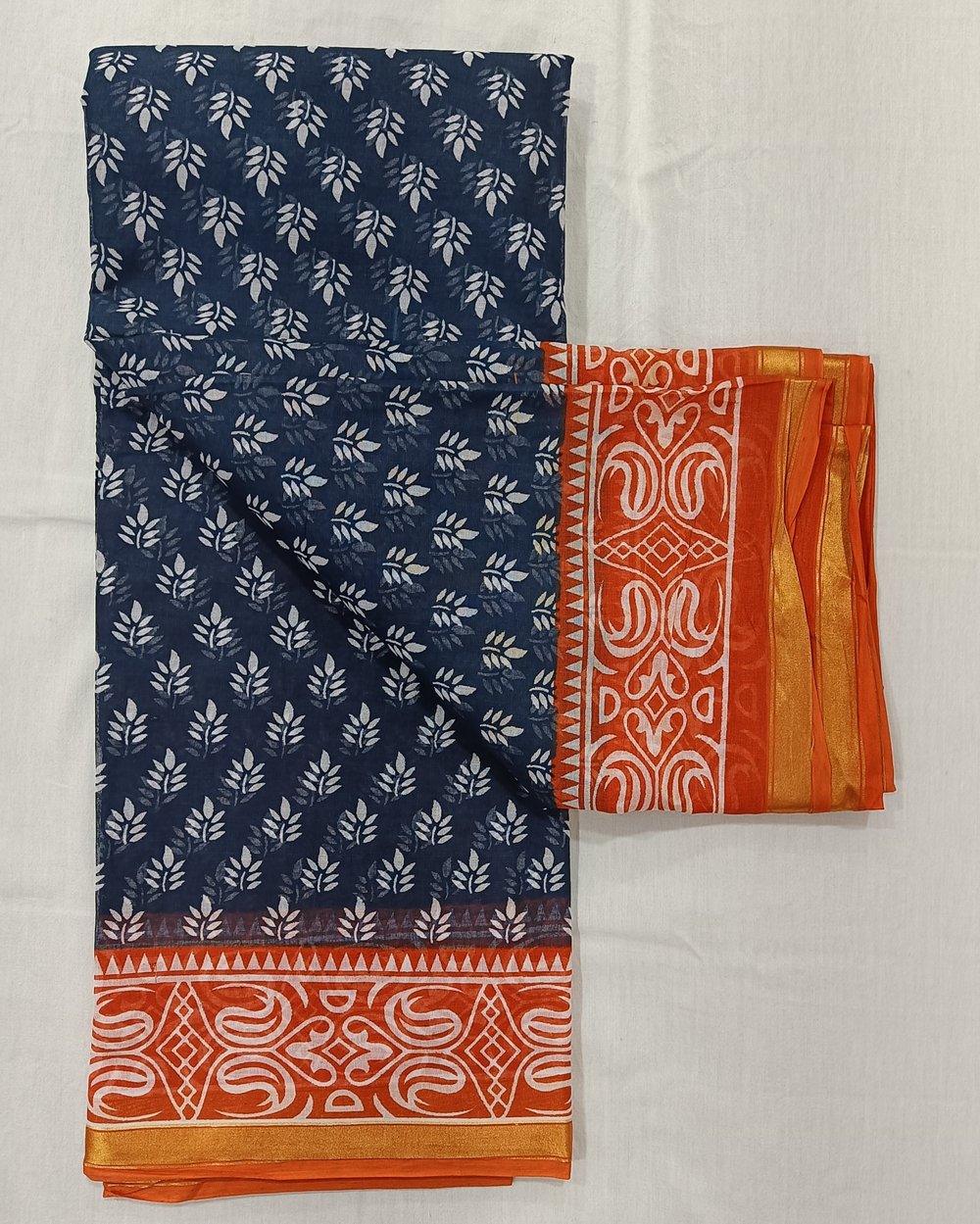 Blue Color Cotton Chanderi Saree With White Floral Design And Orange Pallu