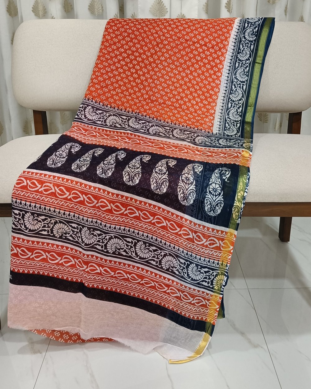 Orange Color Cotton Chanderi Saree With White Floral Design And Black Pallu