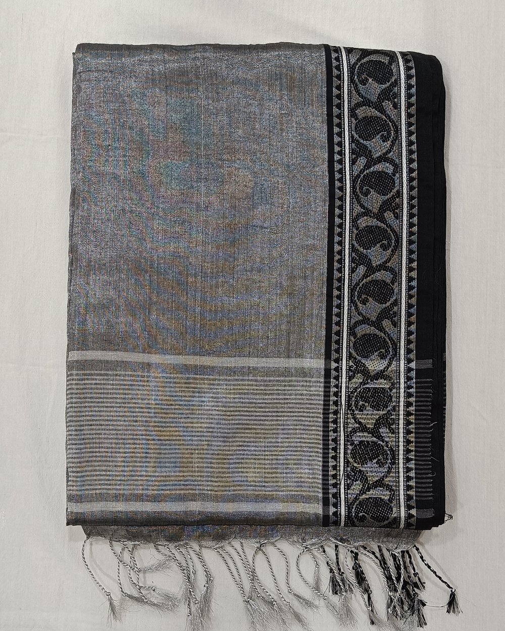 Grey Color Tissue Saree With Small Black and Silver Weaved Border