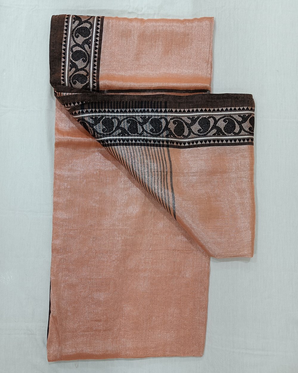 Peach Color Tissue Saree With Small Weaved Border