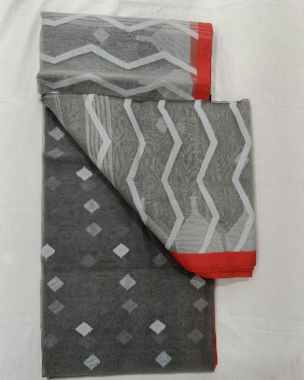 Grey Transparent Muslin Saree With Red Border And White Color Weaving 