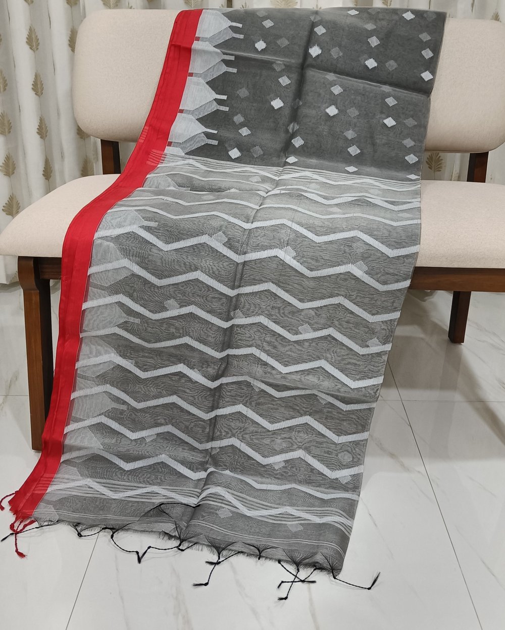 Grey Transparent Muslin Saree With Red Border And White Color Weaving 