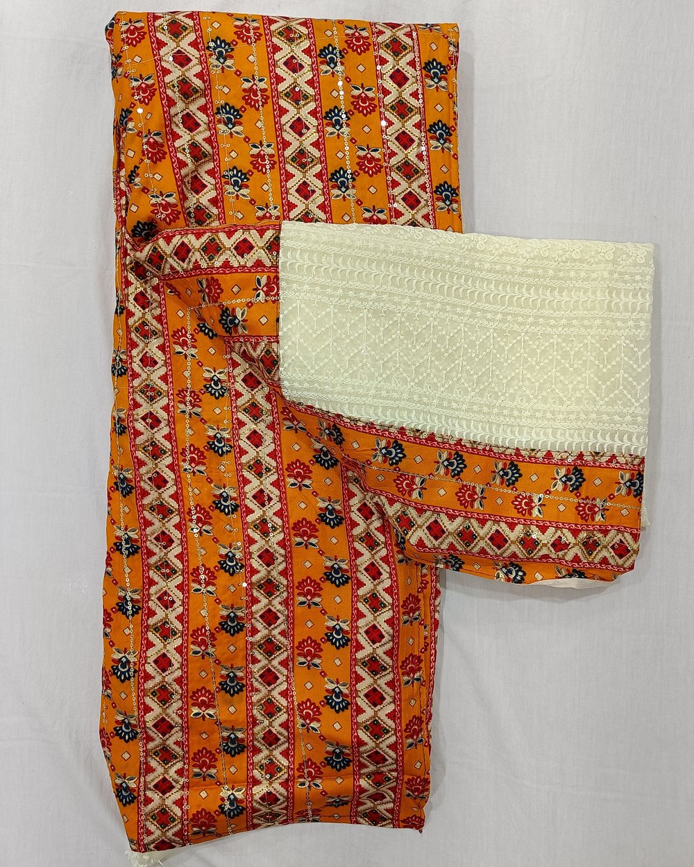 Cream Chickankari Weaved Saree With Multi-color Patola Type Pallu