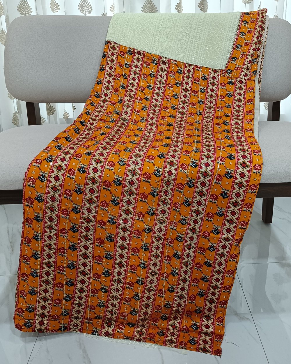 Cream Chickankari Weaved Saree With Multi-color Patola Type Pallu