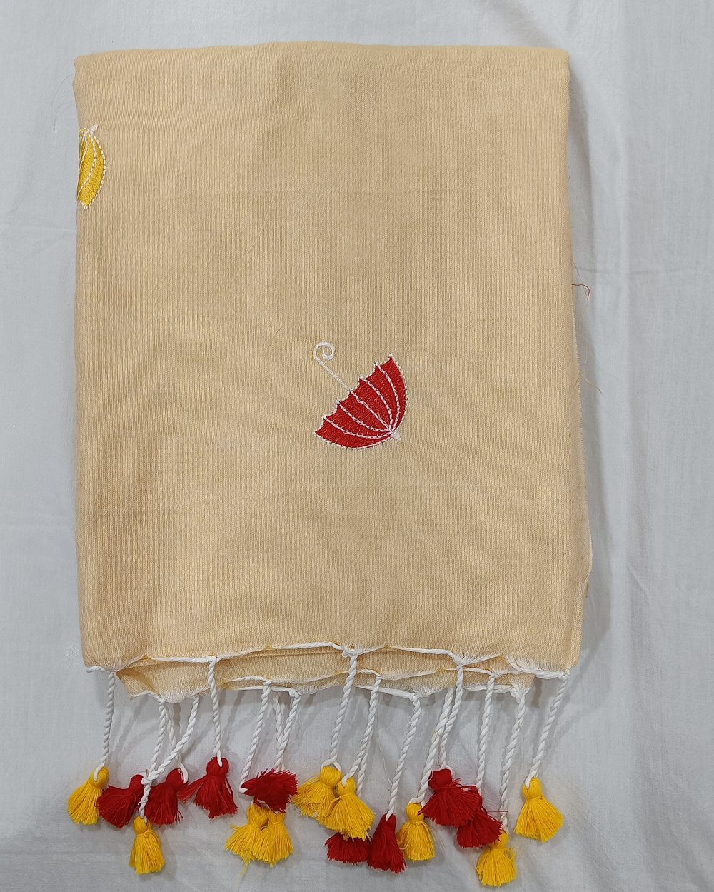 Light Yellow Color Khadi Saree With Umberellas Embroidered in Red