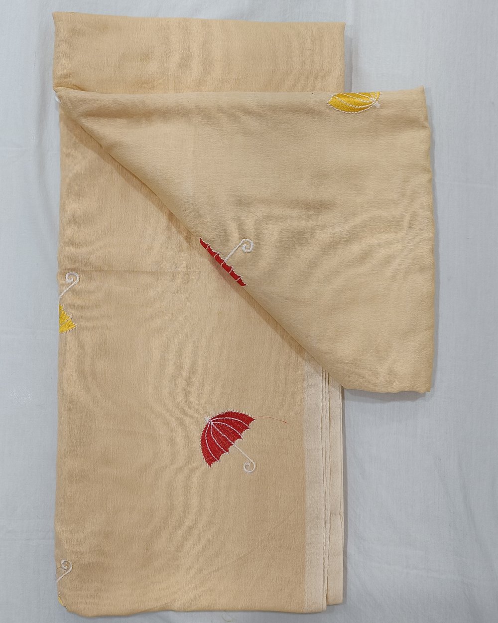 Light Yellow Color Khadi Saree With Umberellas Embroidered in Red