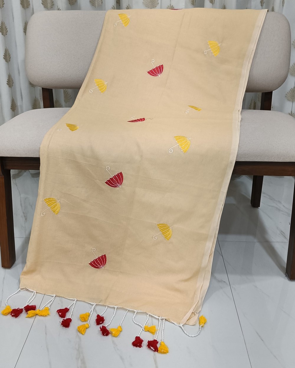 Light Yellow Color Khadi Saree With Umberellas Embroidered in Red