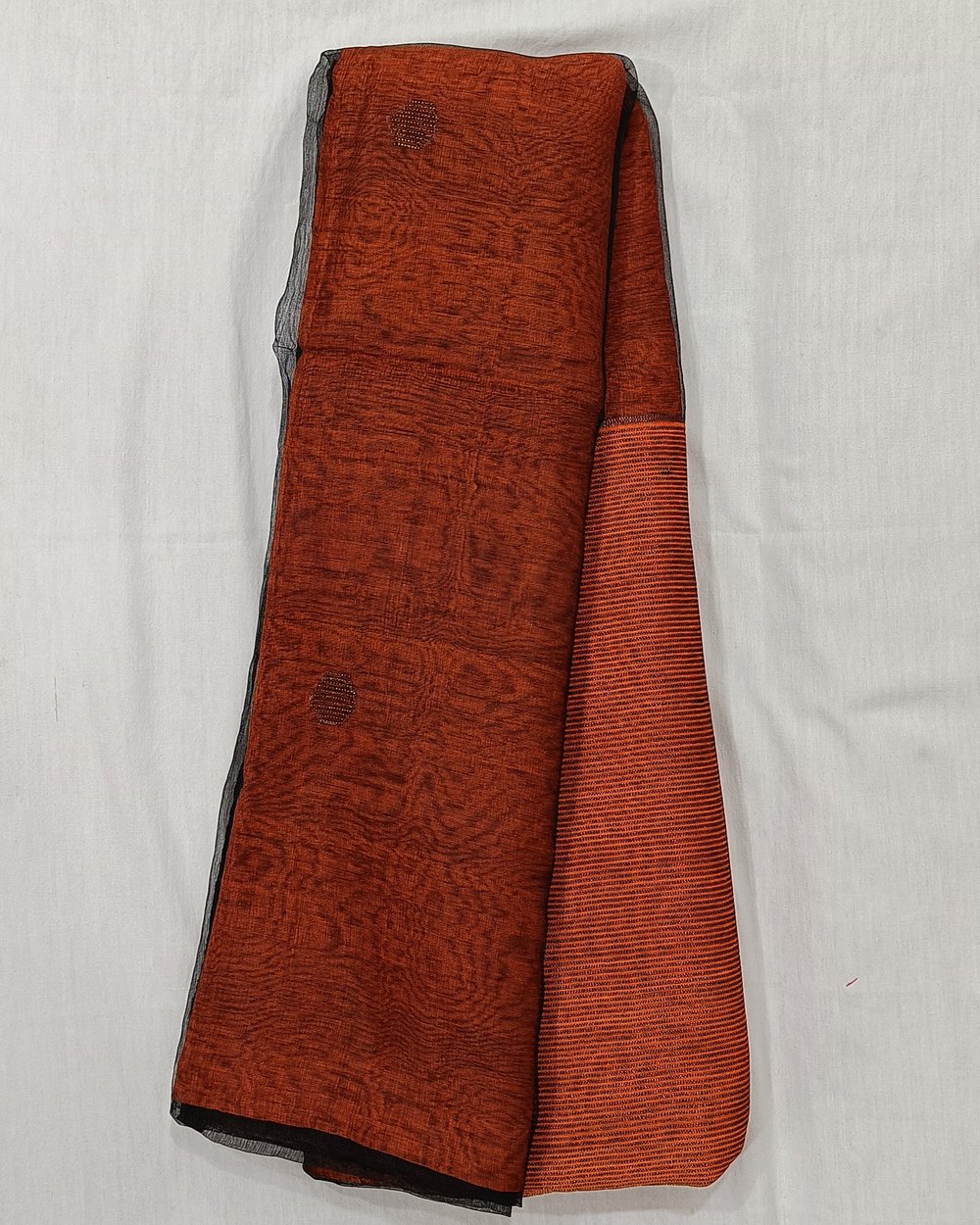 Orange Color Semi Muslin Saree With Handwoven Zari Butas 