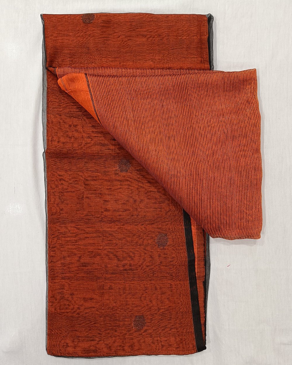 Orange Color Semi Muslin Saree With Handwoven Zari Butas 