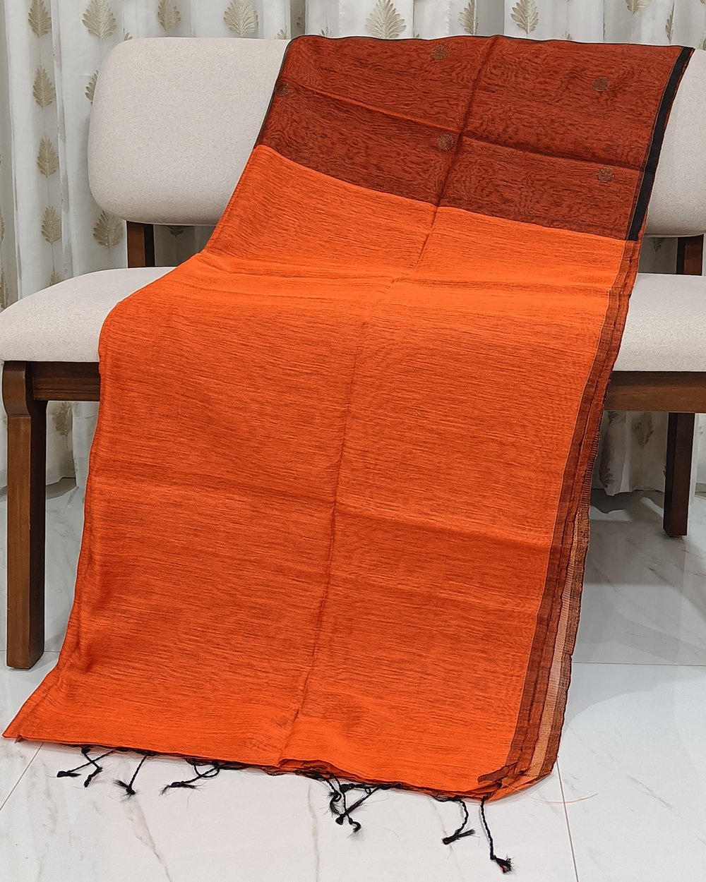Orange Color Semi Muslin Saree With Handwoven Zari Butas 