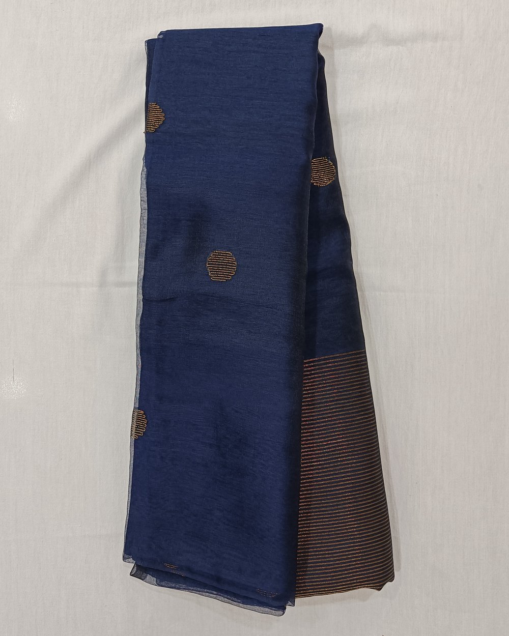 Blue Color Semi Muslin Saree With Handwoven Zari Butas 