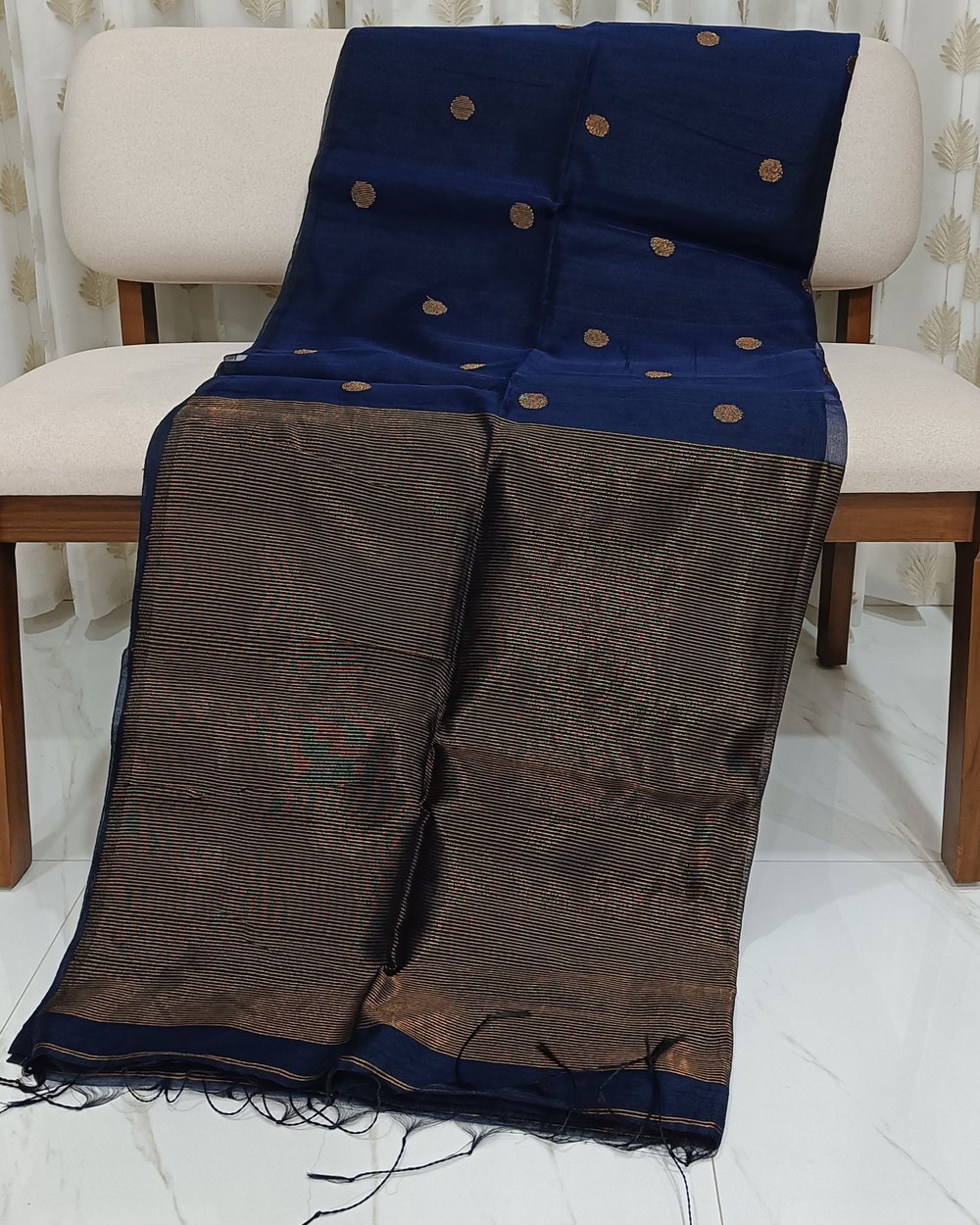 Blue Color Semi Muslin Saree With Handwoven Zari Butas 