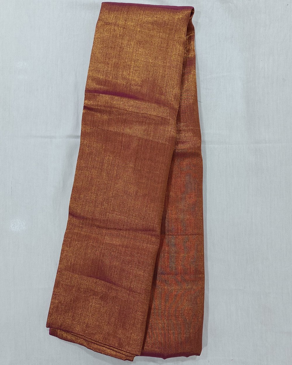 Copper Color Tissue Saree With Tassels At Pallu