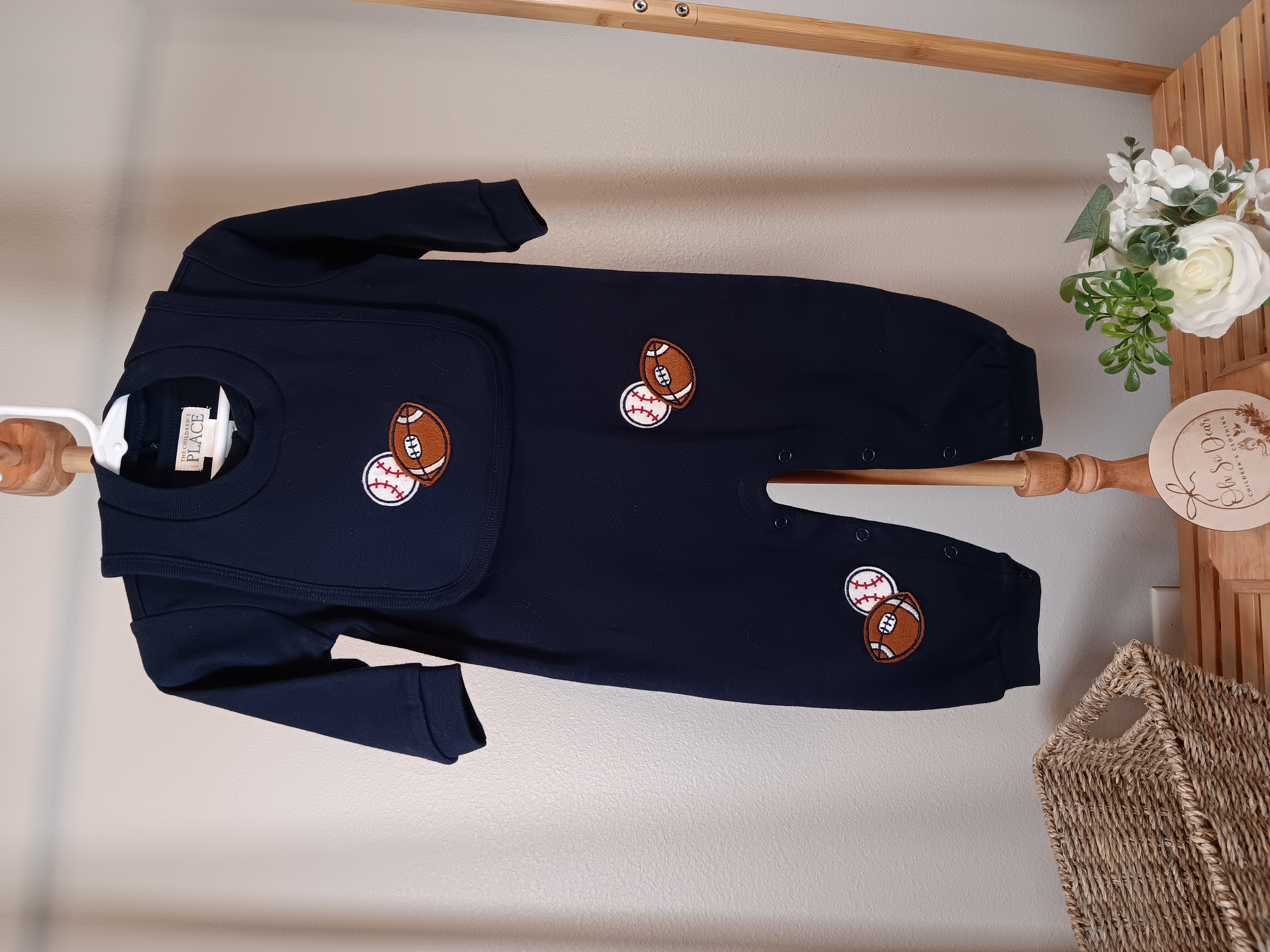 Children's Place Navy Long sleeved romper with Bib sports size 6 to 9 months 