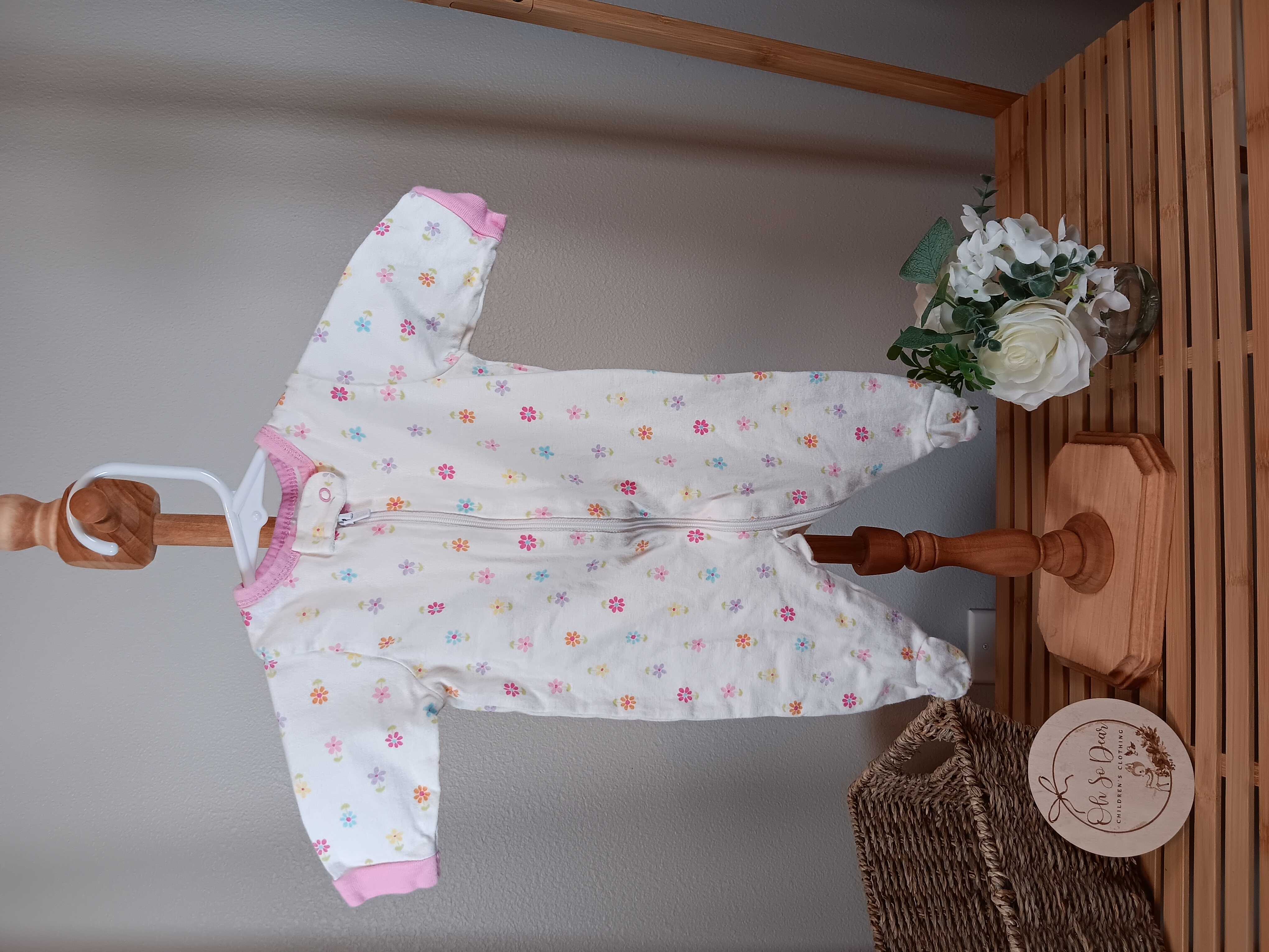White with flowers Gerber sleeper VGUC size newborn 5 to 8 lbs 