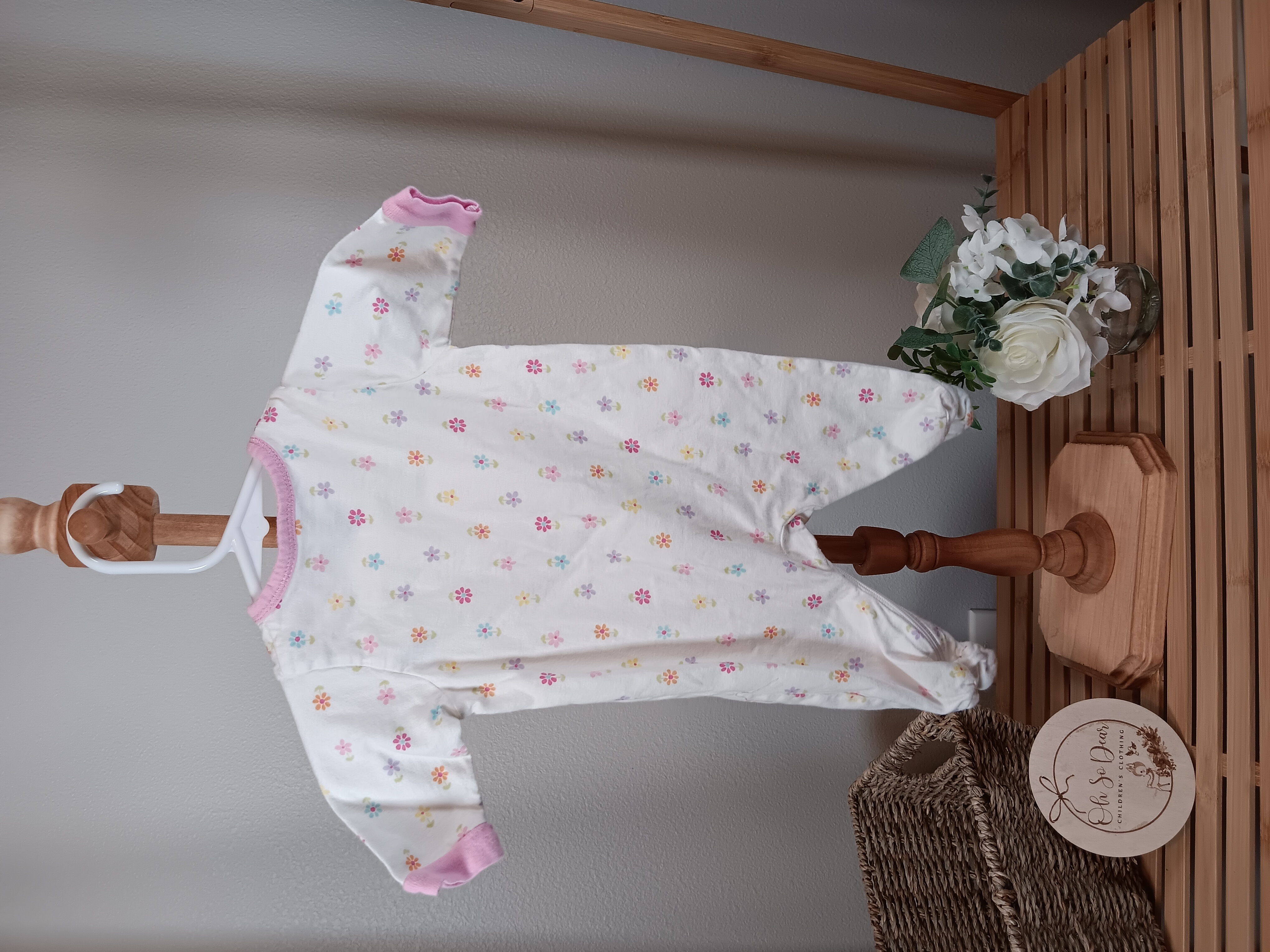White with flowers Gerber sleeper VGUC size newborn 5 to 8 lbs 