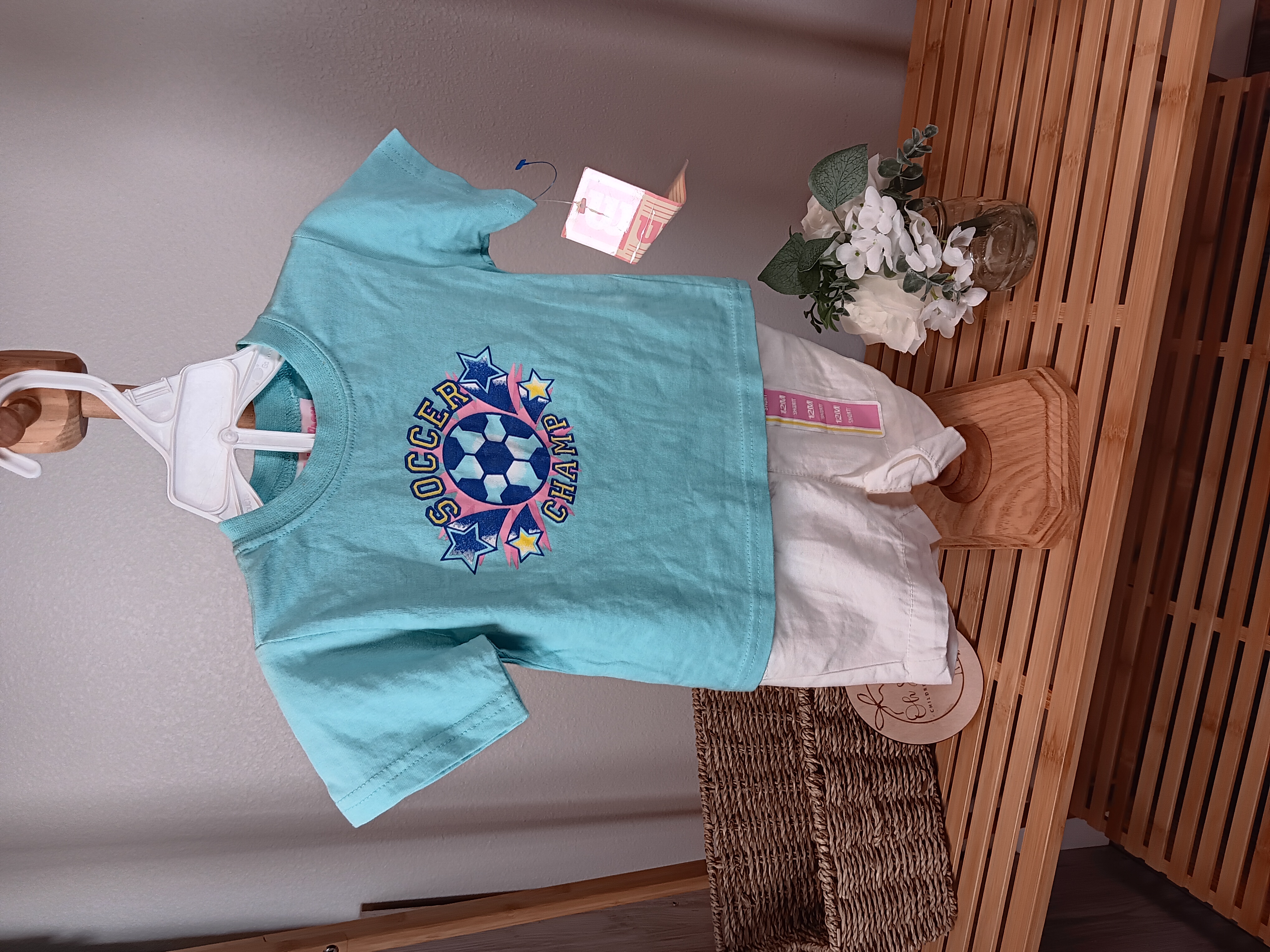 2 piece short set shirt by Wilson, shorts by Circo both 12 months FLAWED