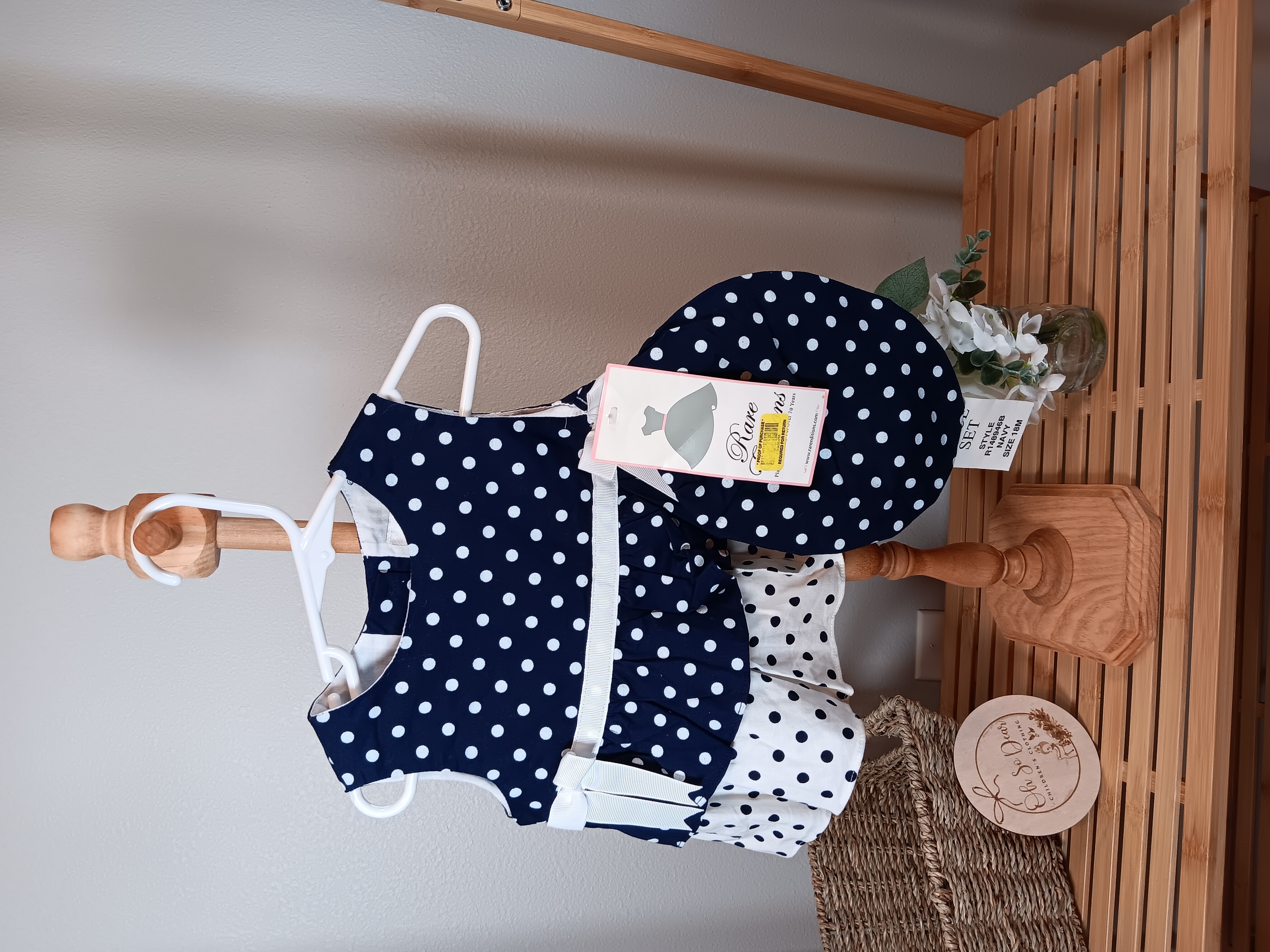 Navy blue Rare Editions brand shirt and beret for the 18 month size little girl missing the bottoms