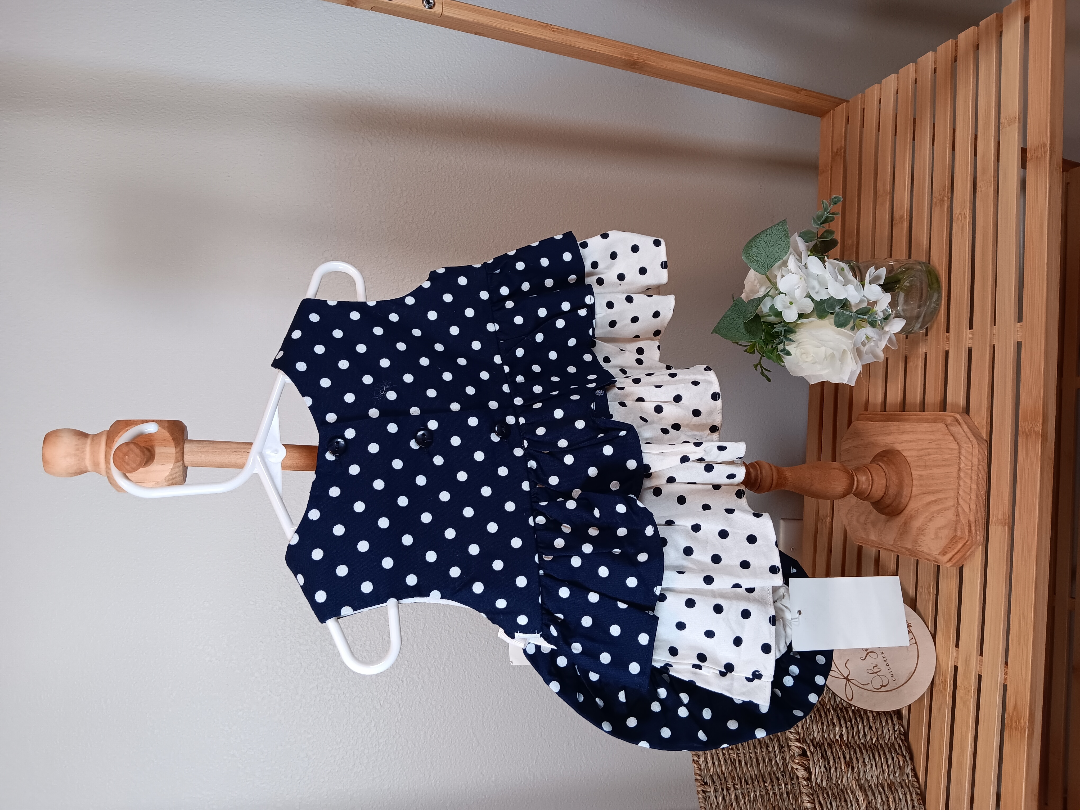 Navy blue Rare Editions brand shirt and beret for the 18 month size little girl missing the bottoms