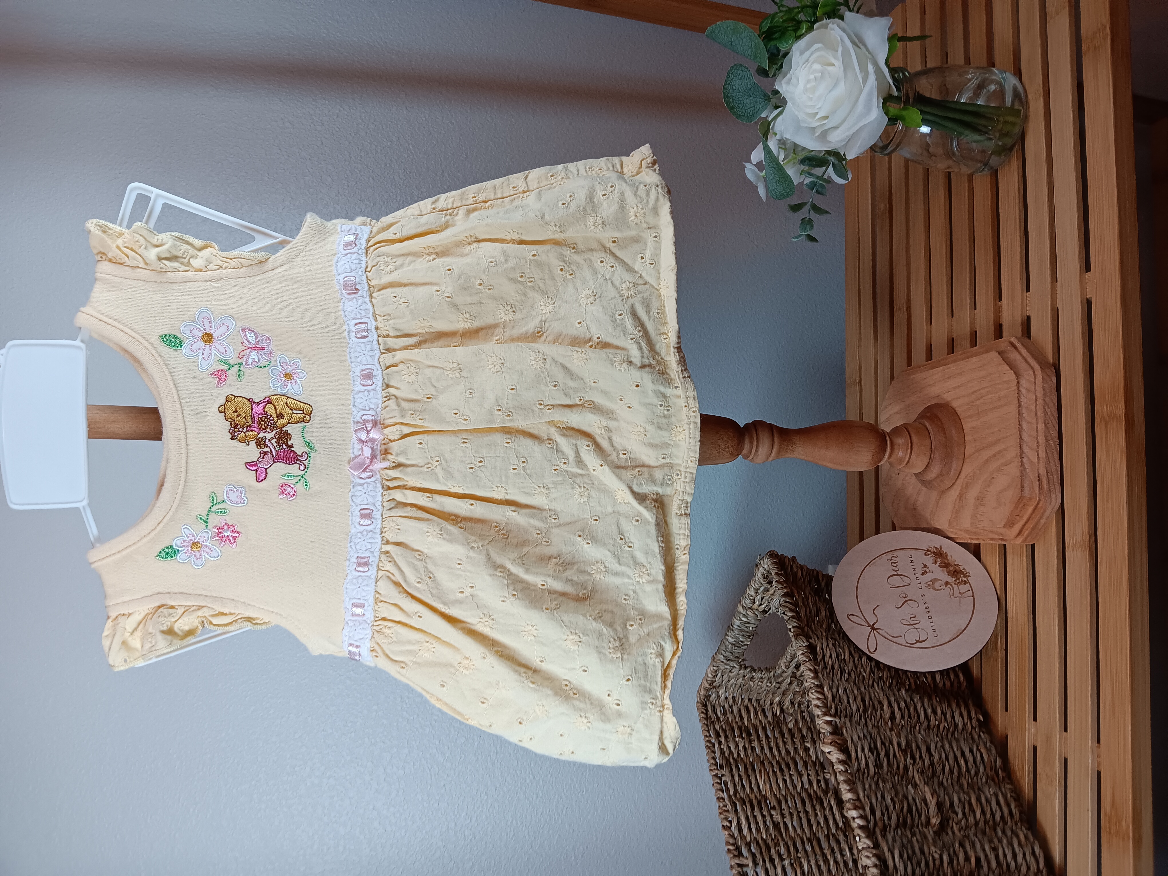 Yellow eyelet Baby Dress with Winnie the Pooh Embroidery