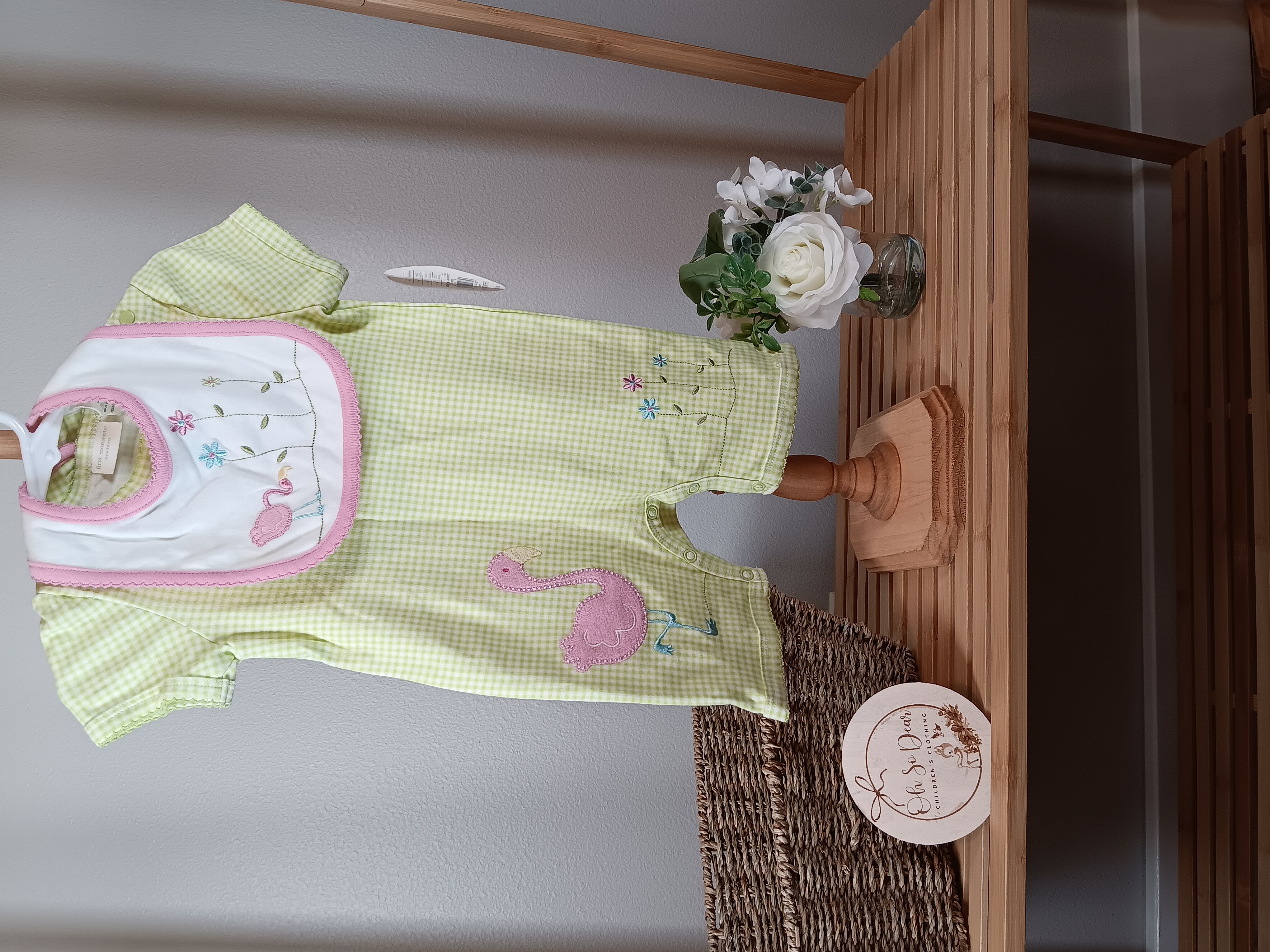 Baby Romper with Flamingo Bib size 6 to 9 months from First Moments brand.