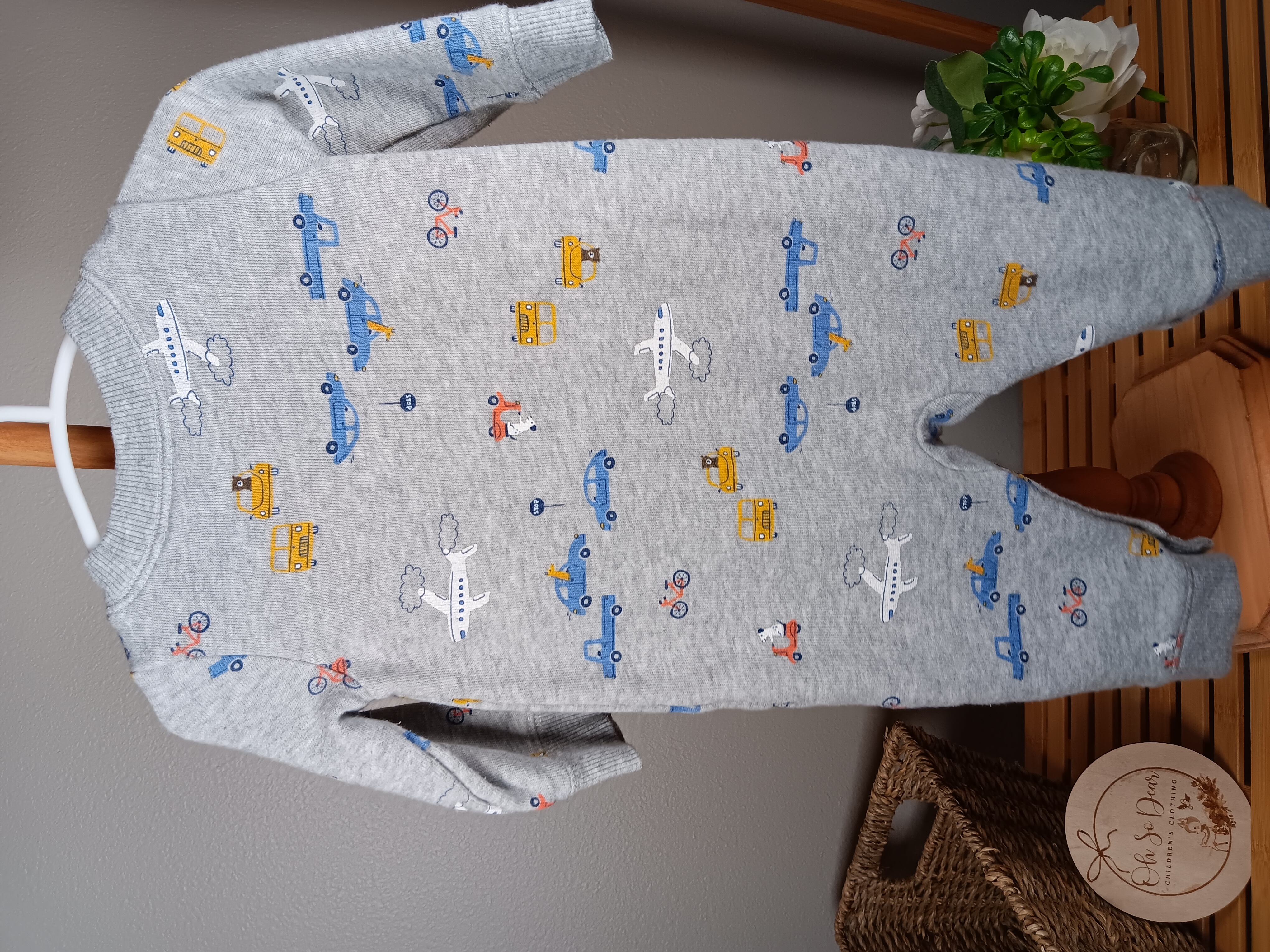 Baby romper with transportation print Carters size 6 months Soft gray jumpsuit featuring planes, cars, and trucks