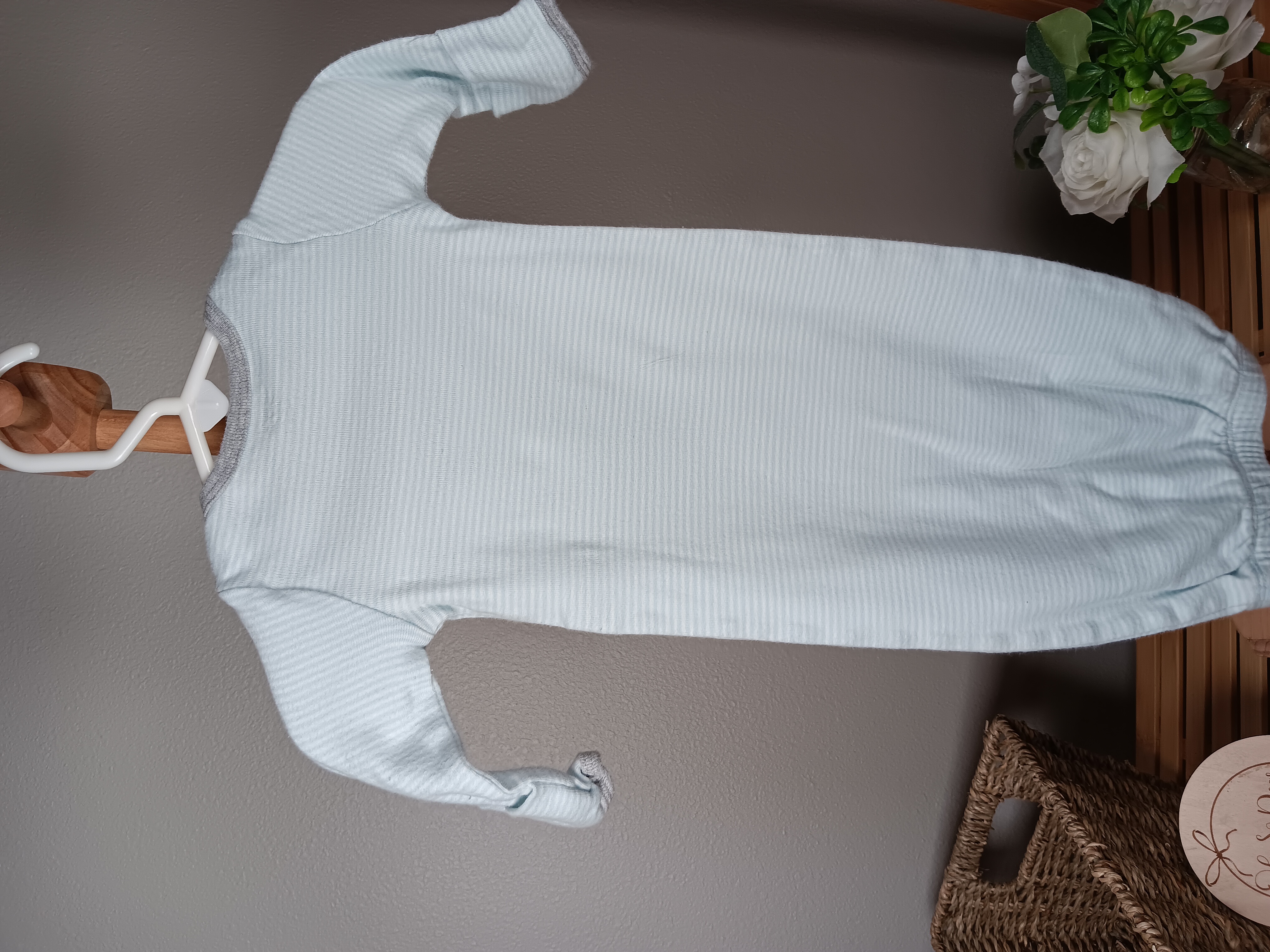 Newborn size gown from Carters with Elephant embroidered on chest says Mommy Loves Me