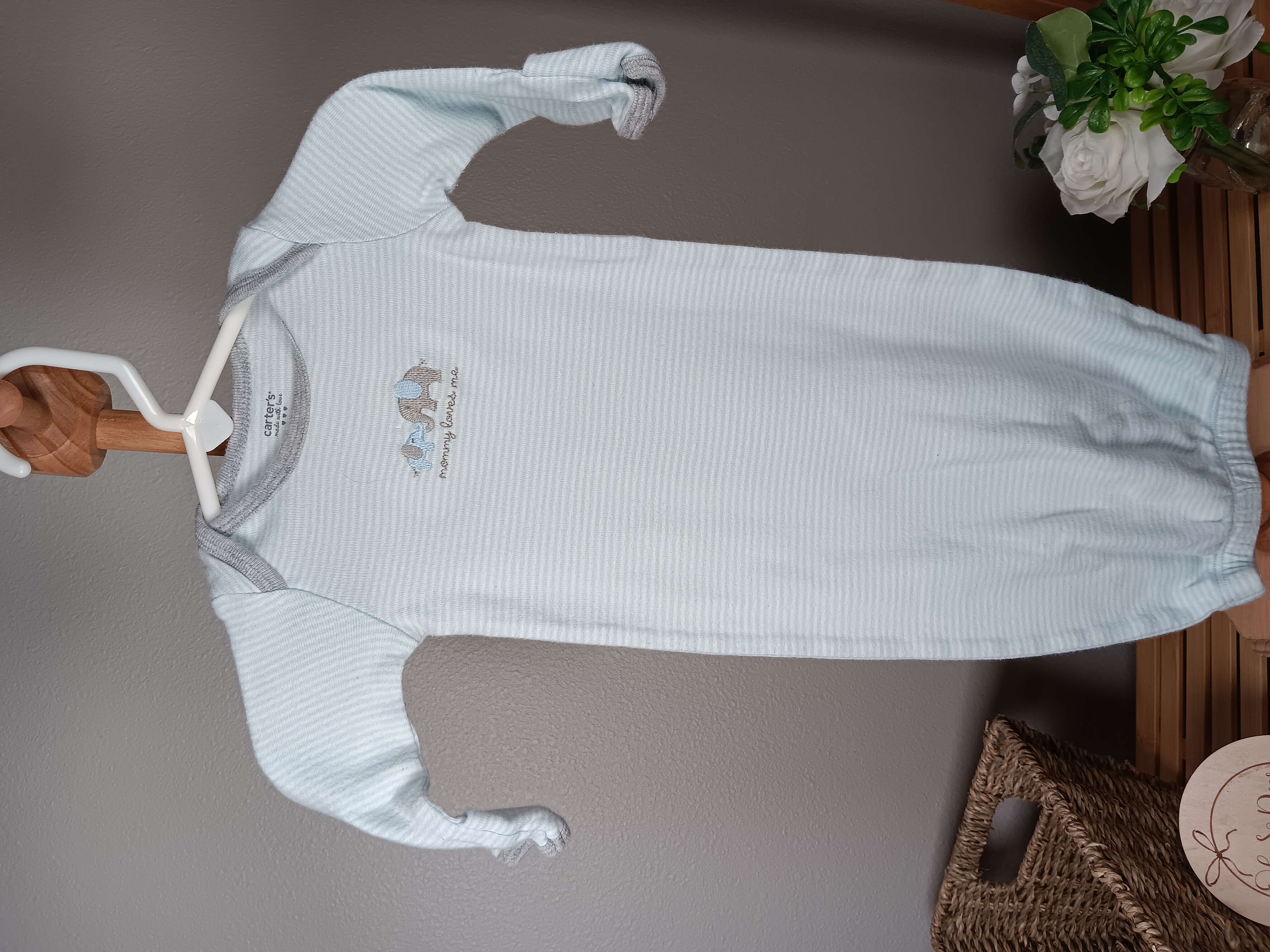 Newborn size gown from Carters with Elephant embroidered on chest says Mommy Loves Me