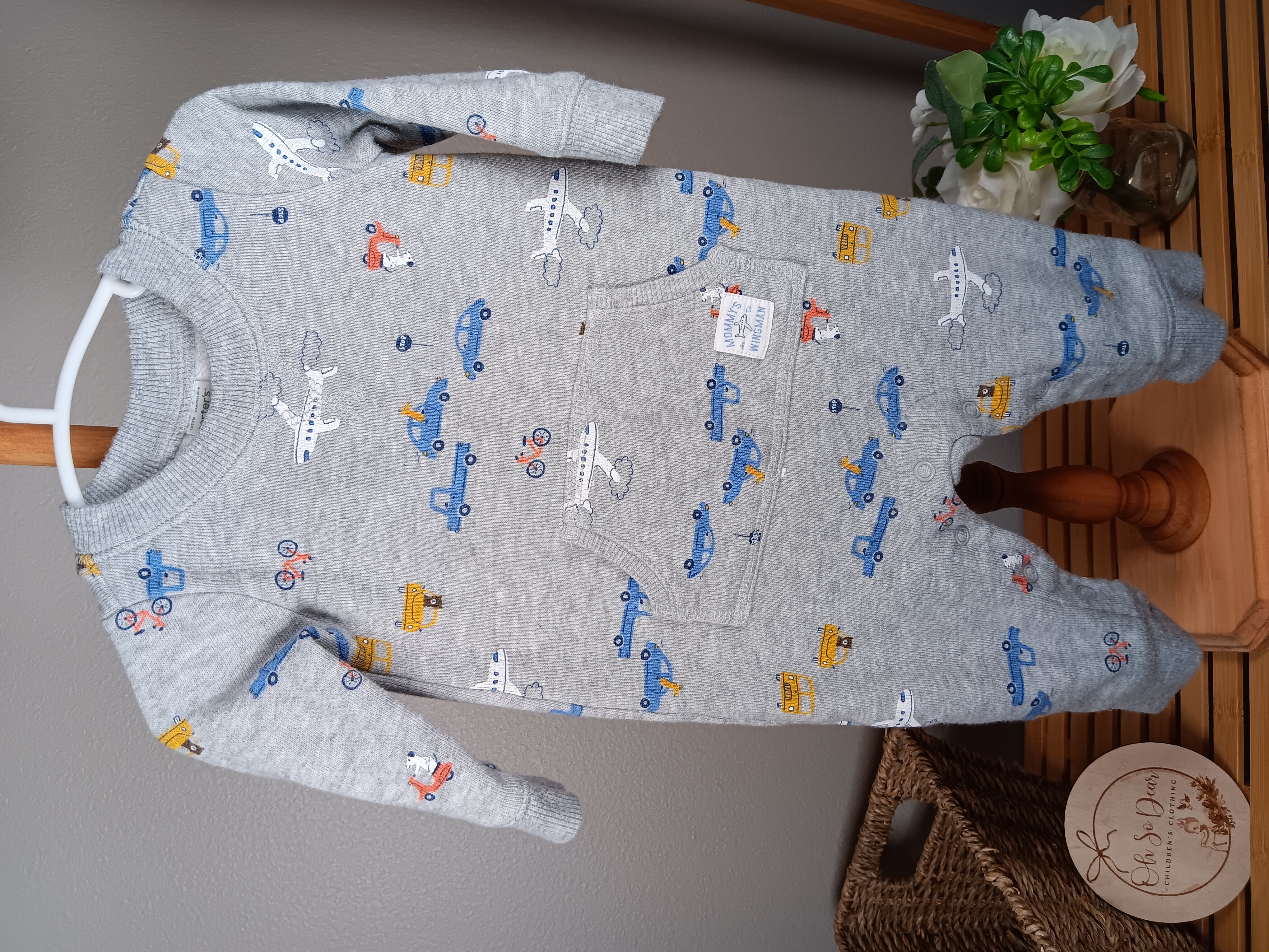 Baby romper with transportation print Carters size 6 months Soft gray jumpsuit featuring planes, cars, and trucks